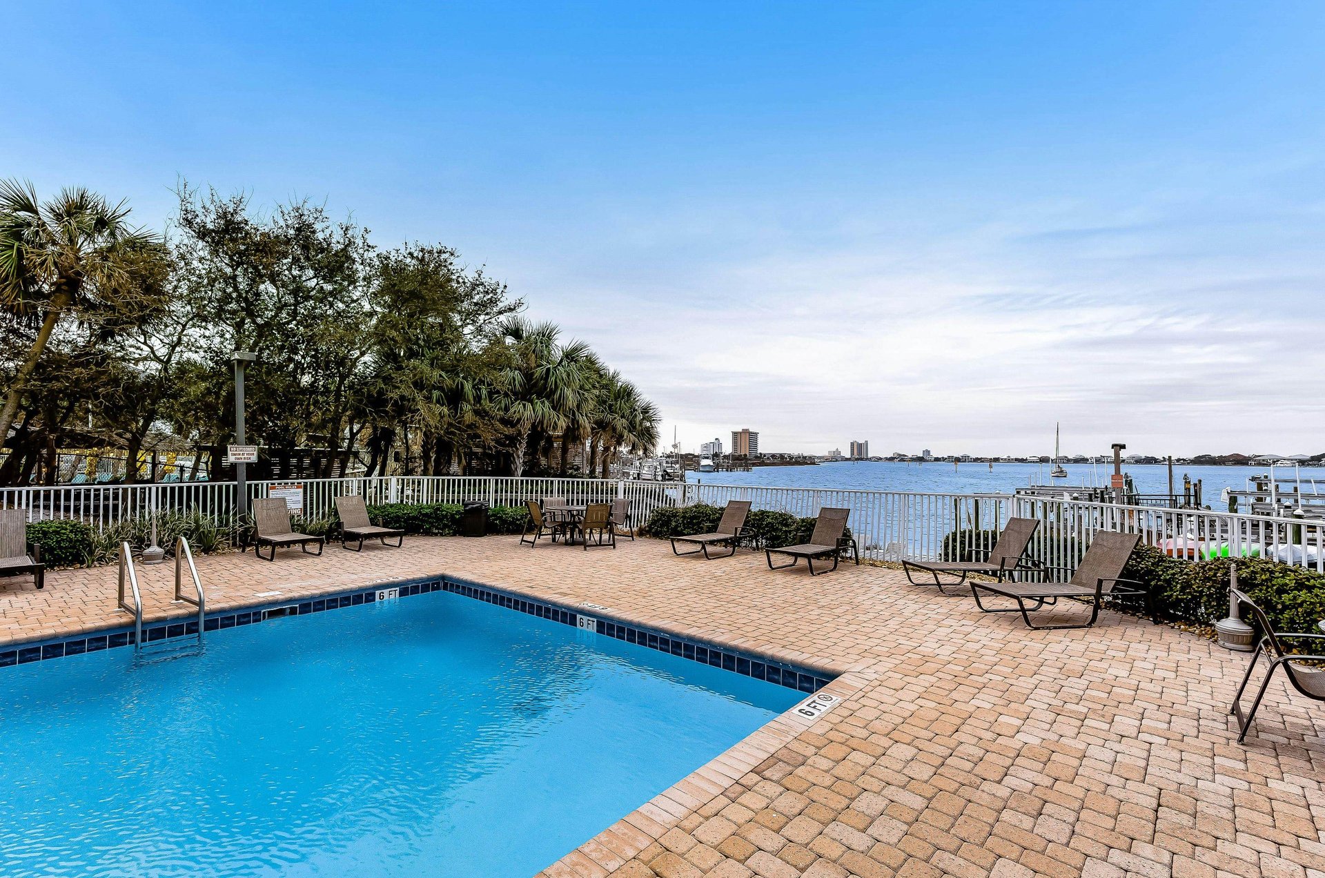 Relax by the outdoor, bayside pool