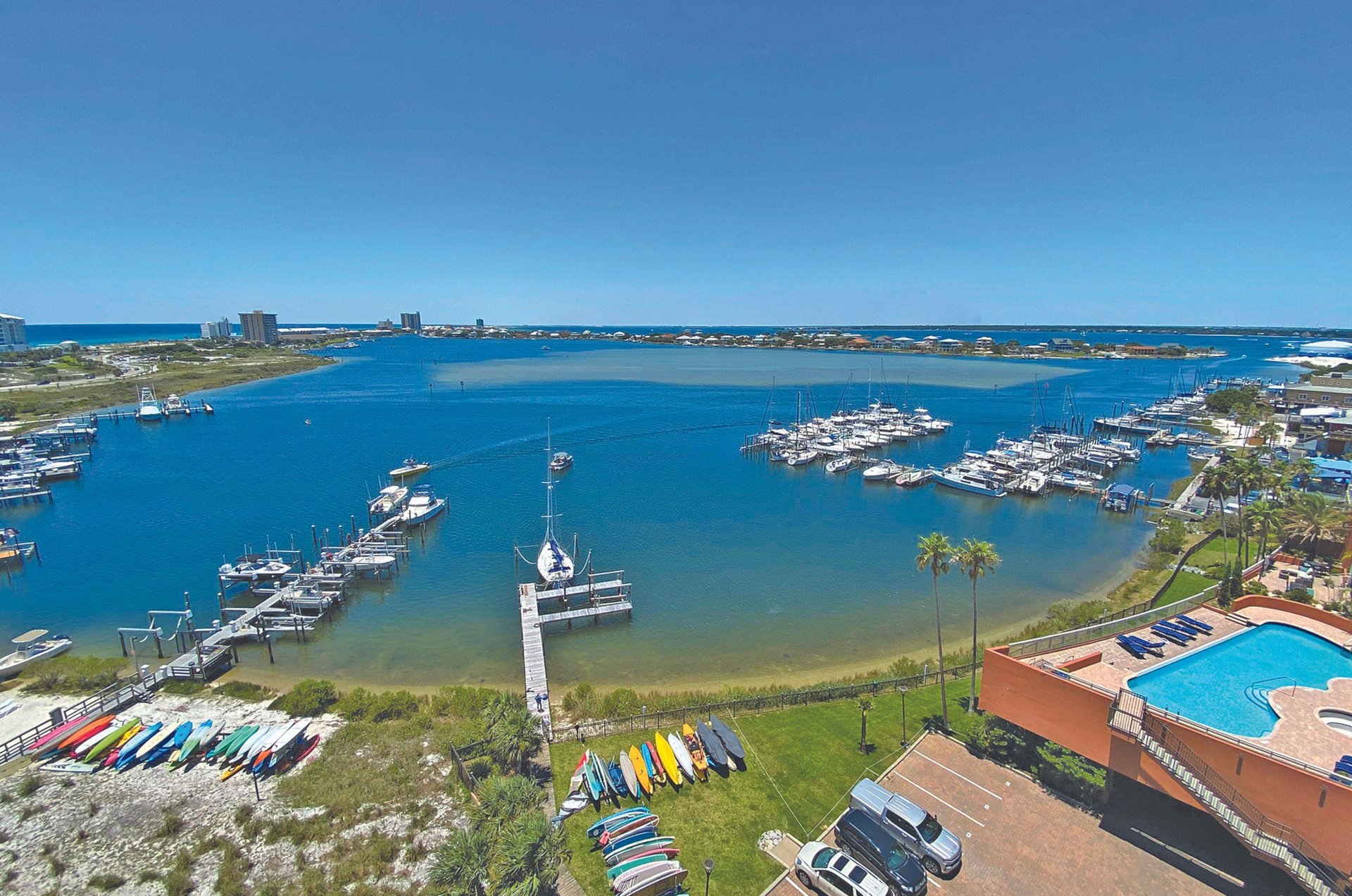 The property includes access to a private dock on the bay