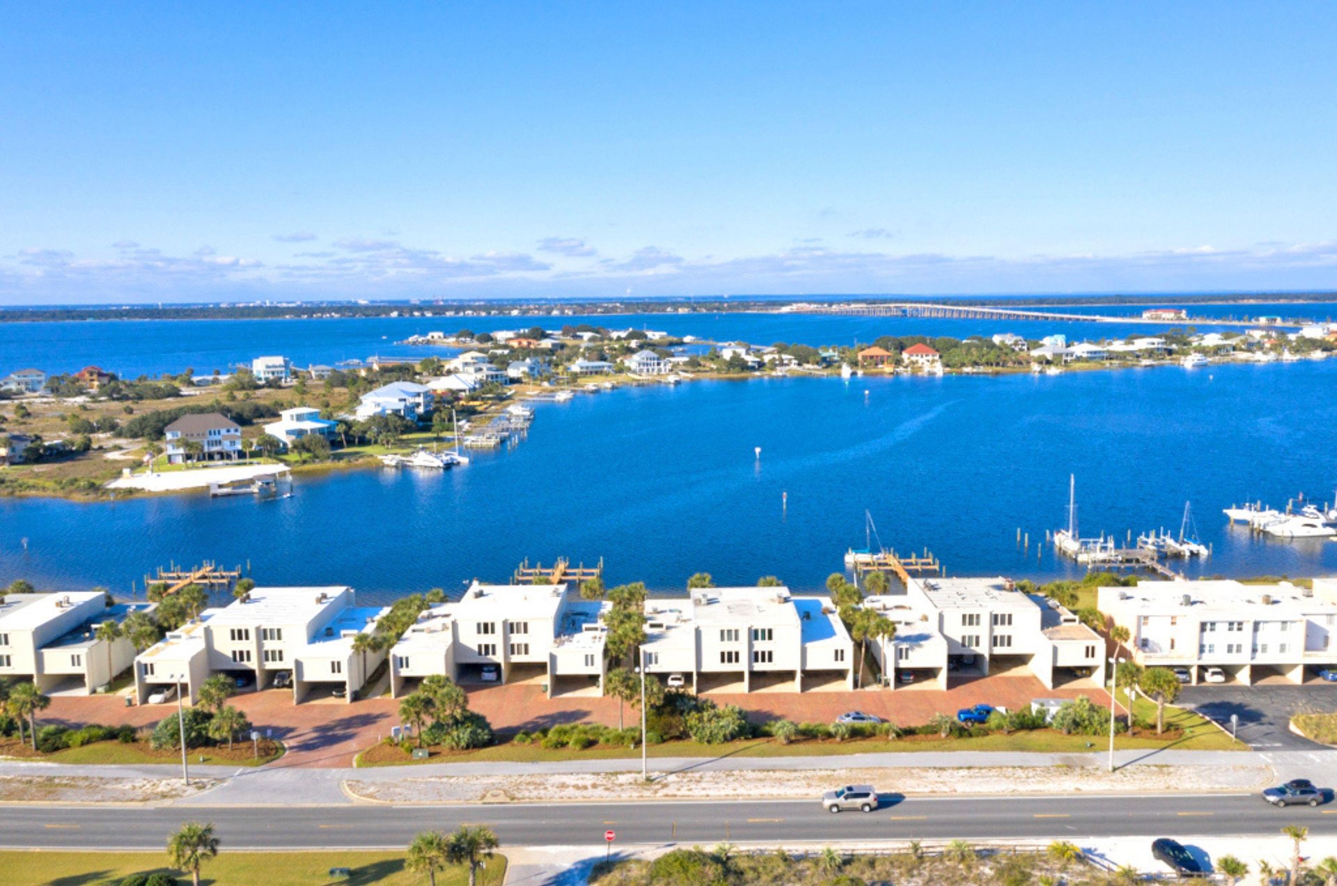 Treehouse Townhomes are nestled between Little Sabine Bay and the Gulf of Mexico