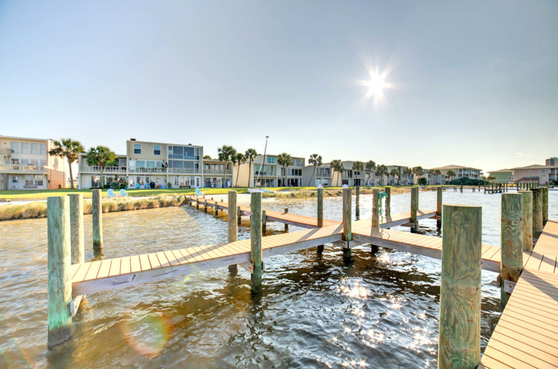 The private pier on Little Sabine Bay at Treehouse Townhomes