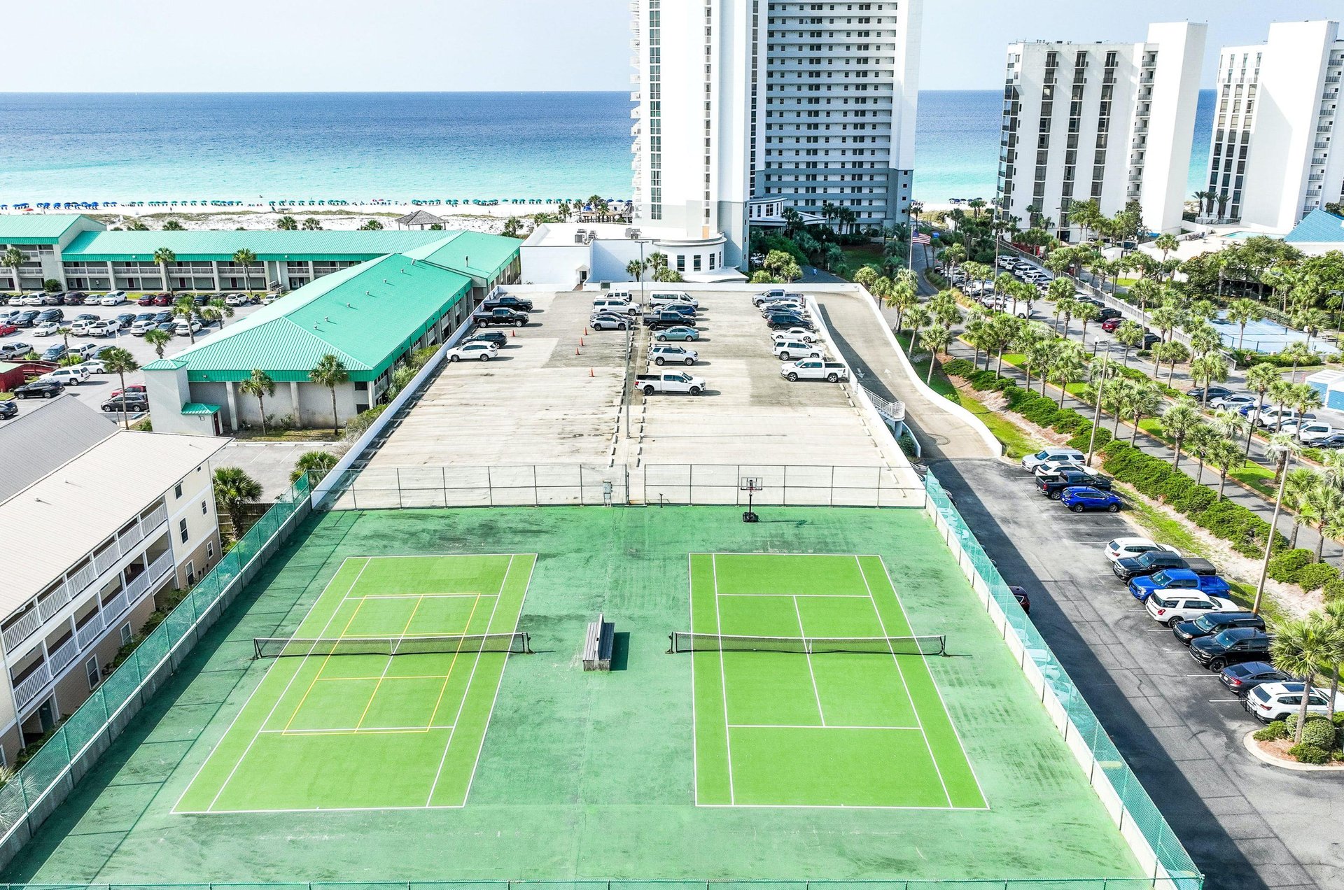 The community has rooftop tennis courts for guests