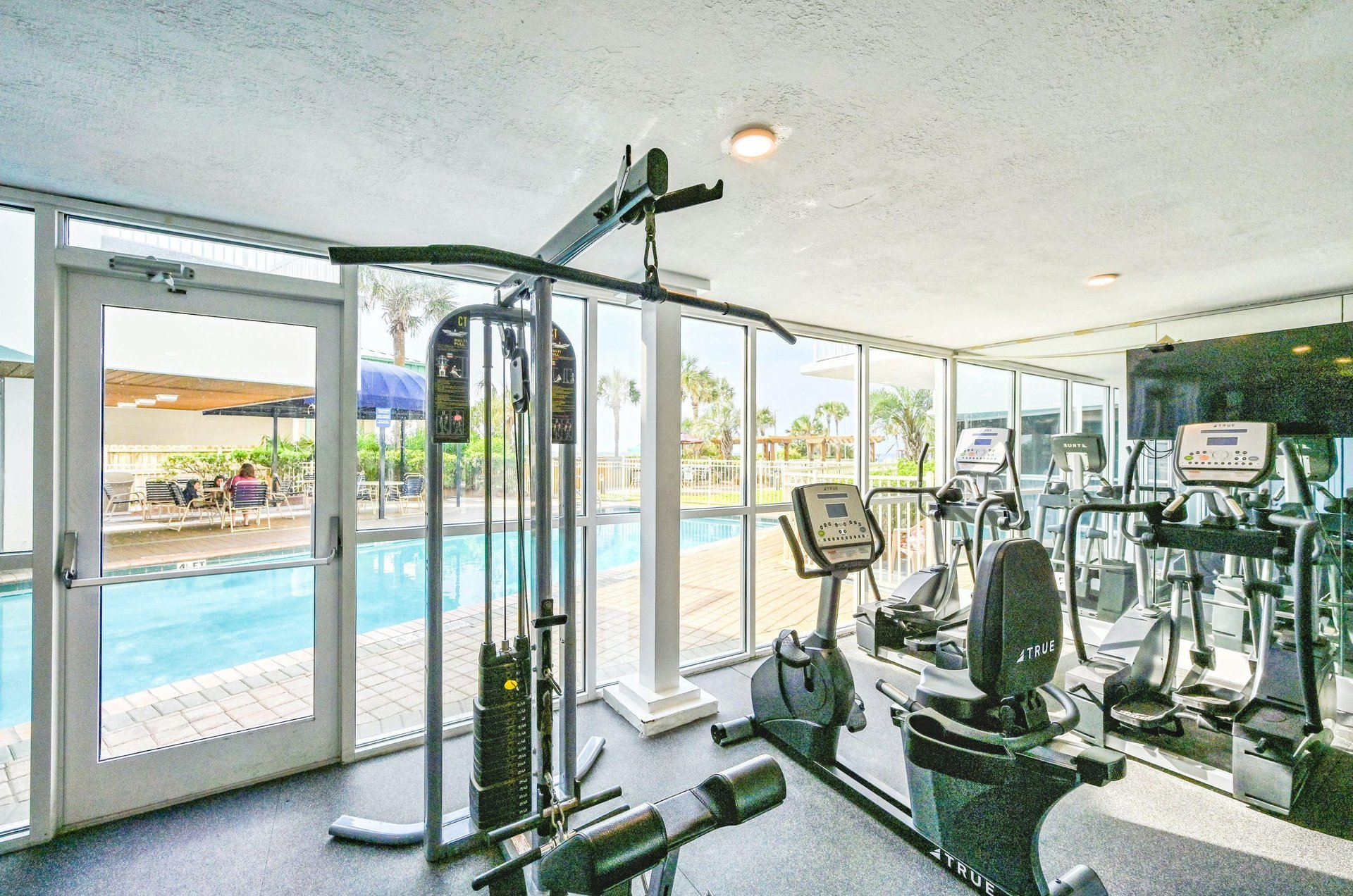A poolside fitness room