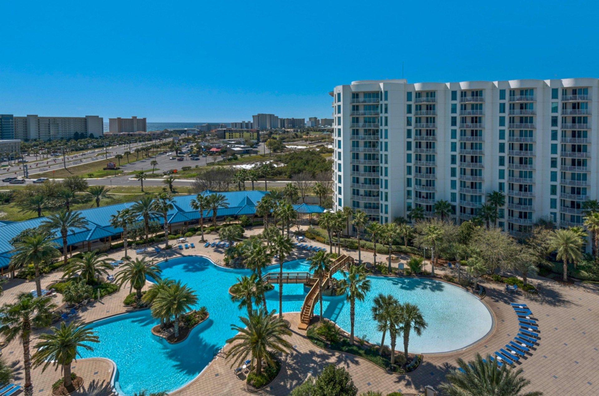 Aerial view of the lagoon pool with the Gulf across the way