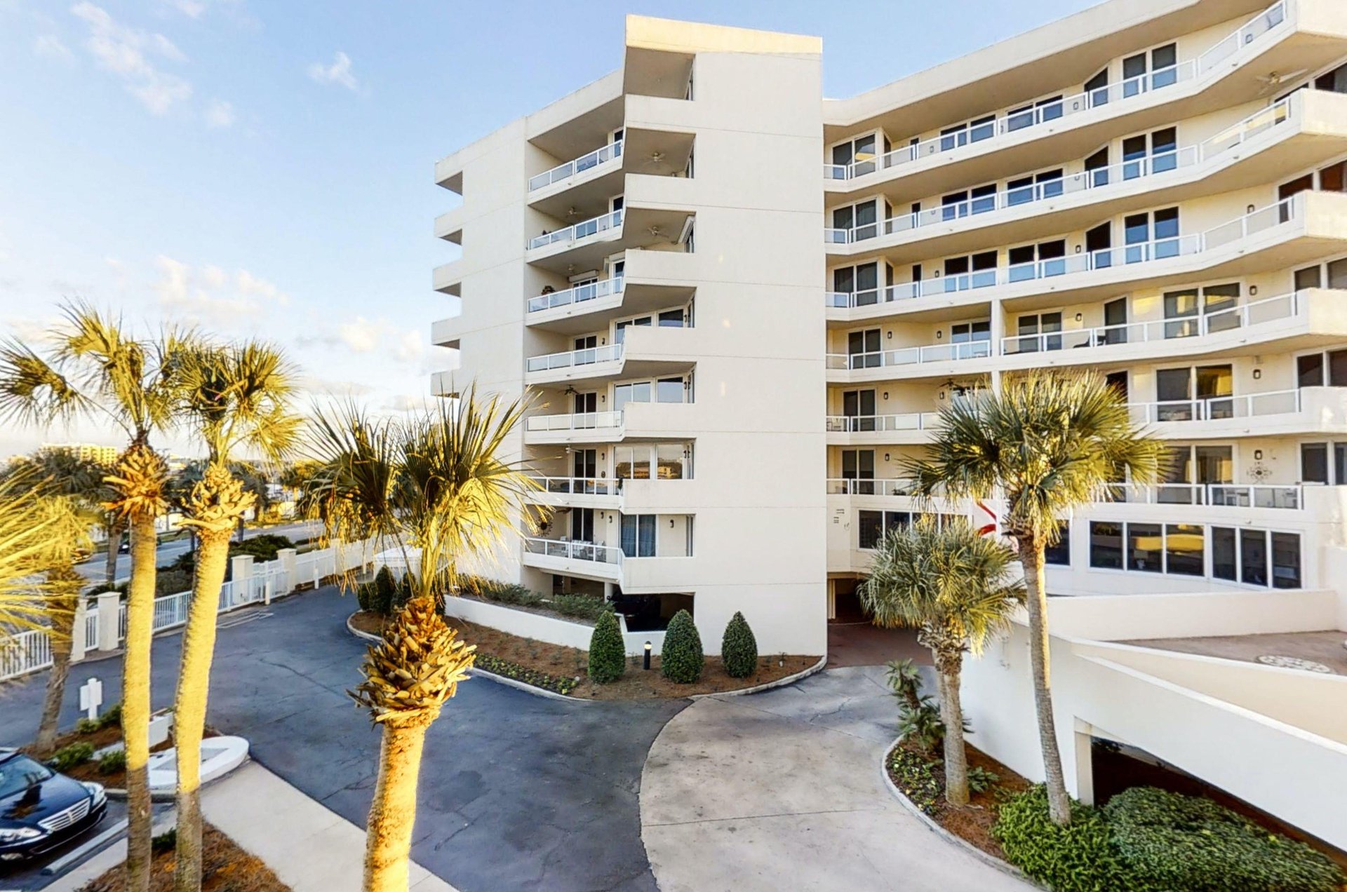 The gated entrance to the eightstory complex.