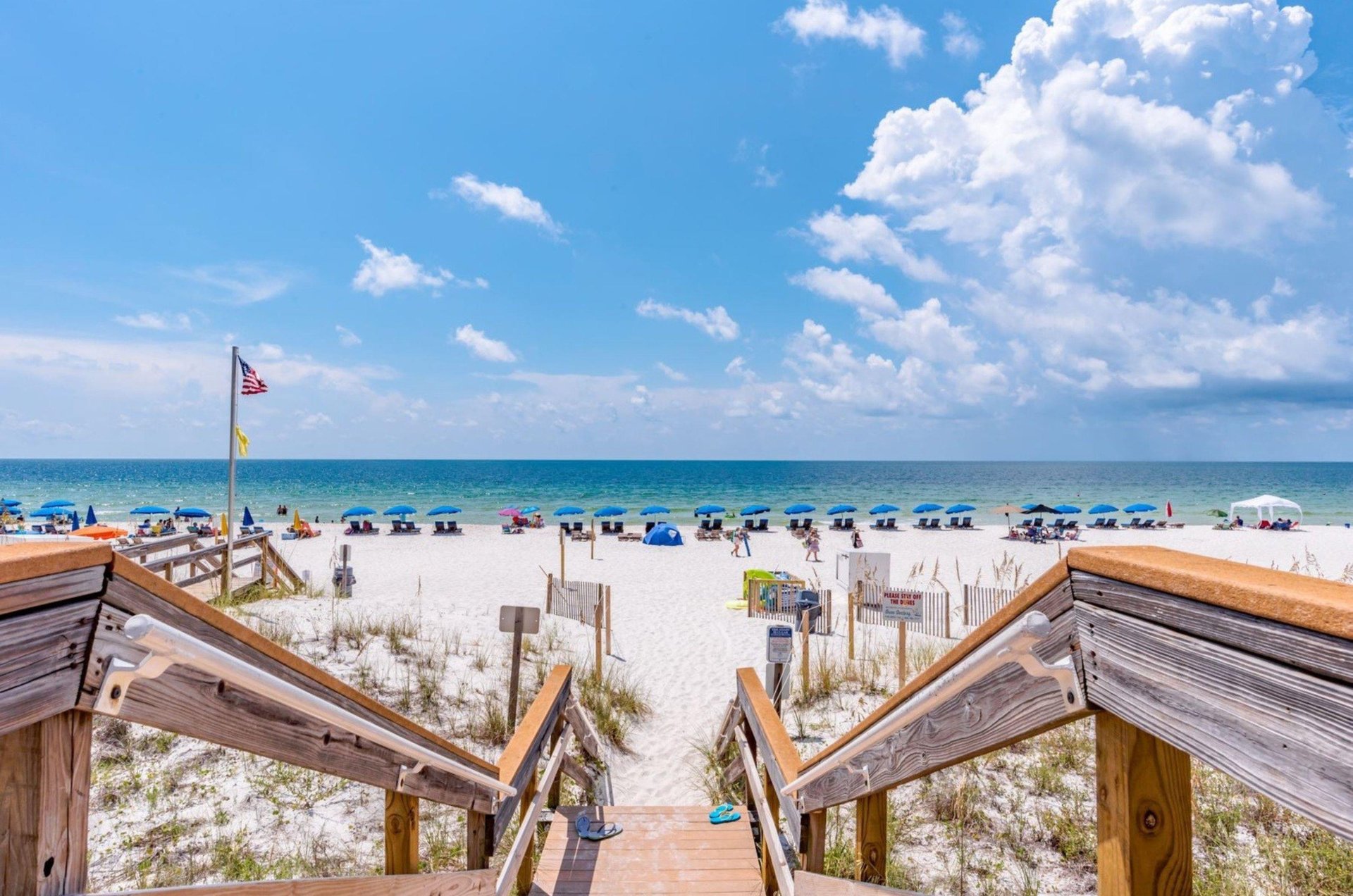 The wooden boardwalk out to Perdido Beach from Ocean Breeze East Condos