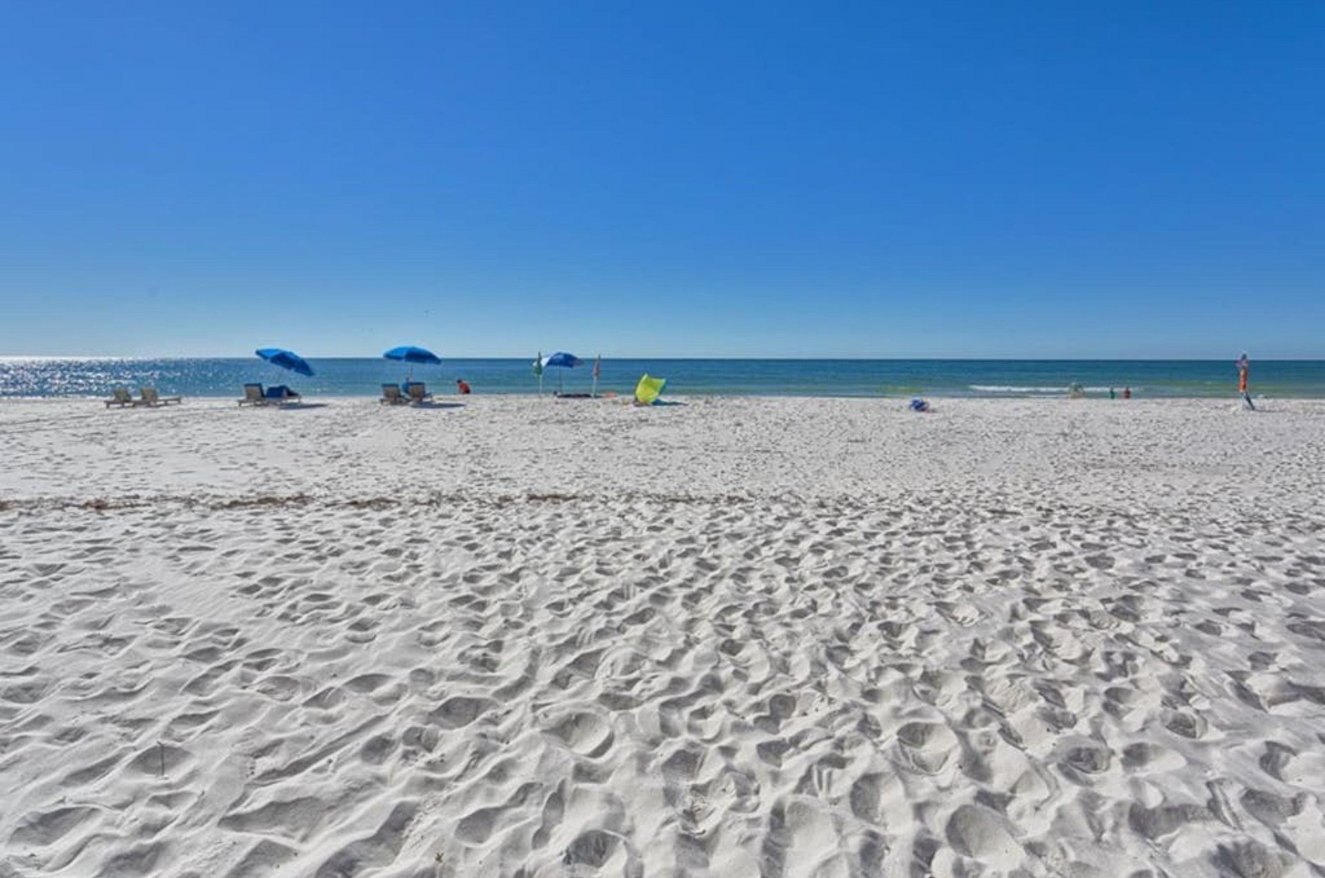 The white sandy beaches next to Ocean Breeze East Condos in Perdido Key, Florida