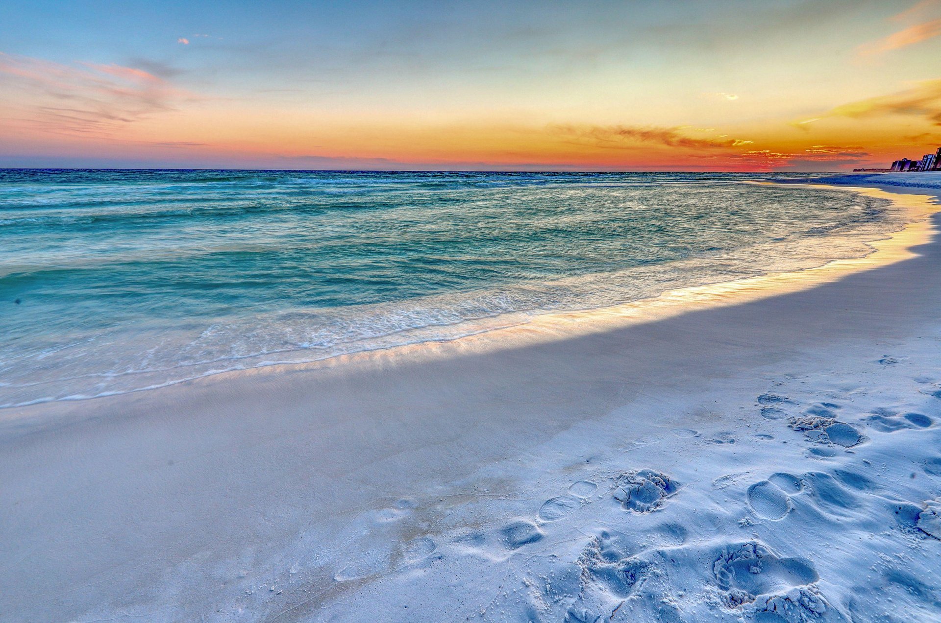 A spectacular sunset over the adjacent beach.