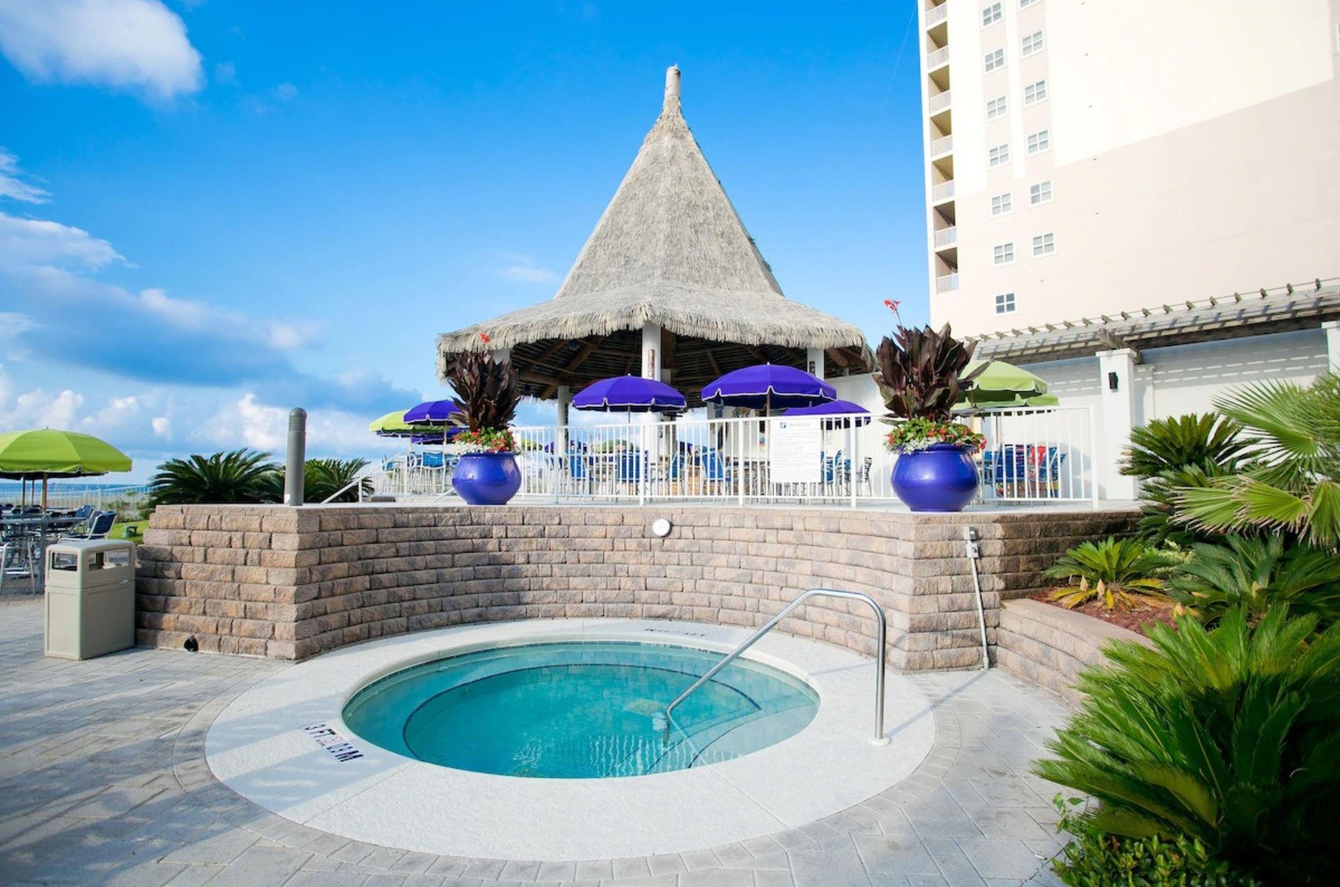 Unwind in the outdoor hot tub at Holiday Inn Resort Pensacola