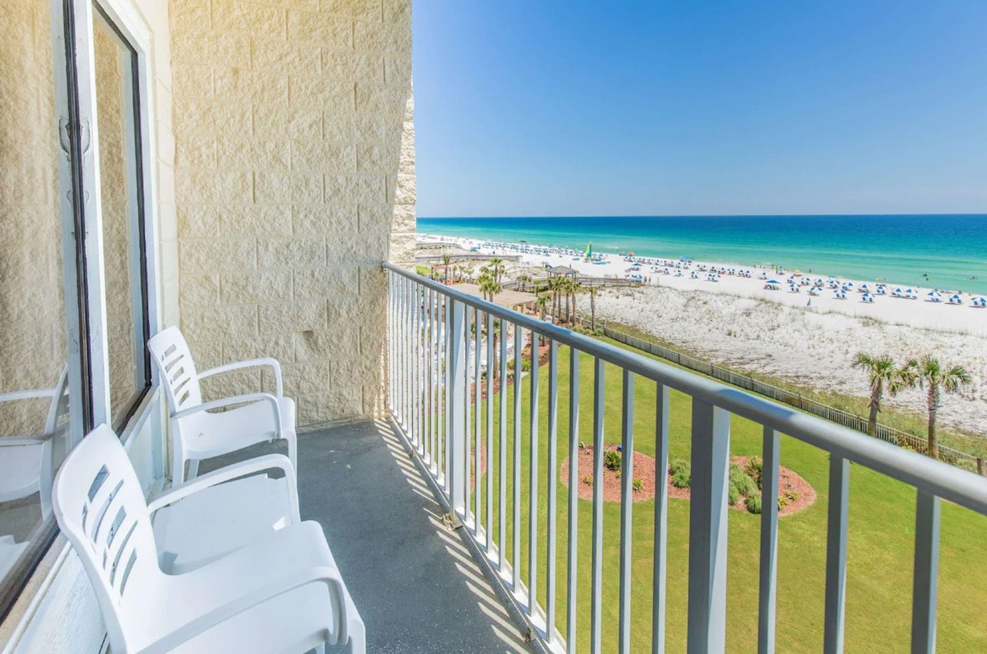 See for miles down the coast from a private balcony at Hampton Inn Pensacola beach