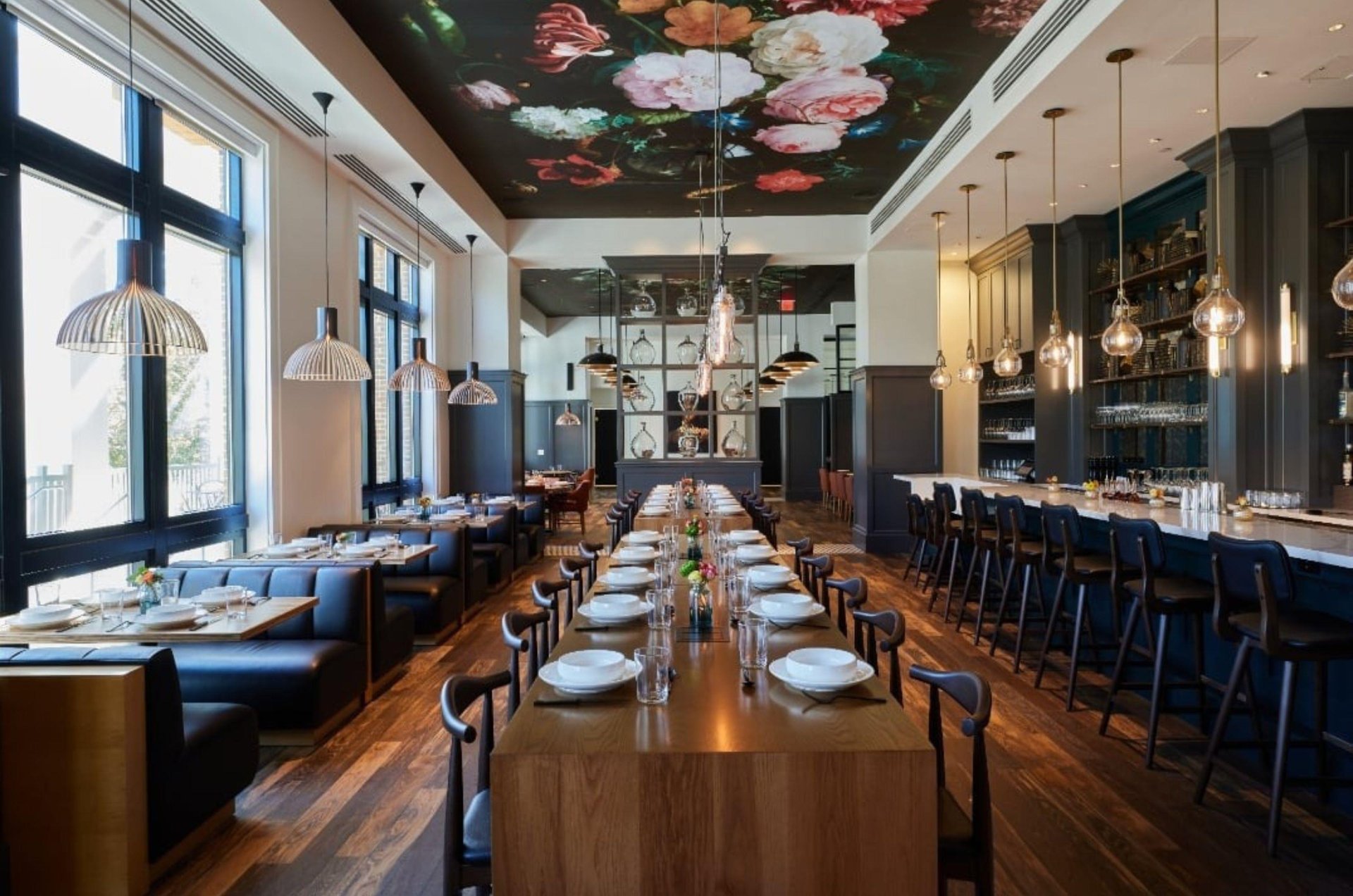 Set tables and chairs at Ovide the onsite restaurant at Hotel Effie Sandestin