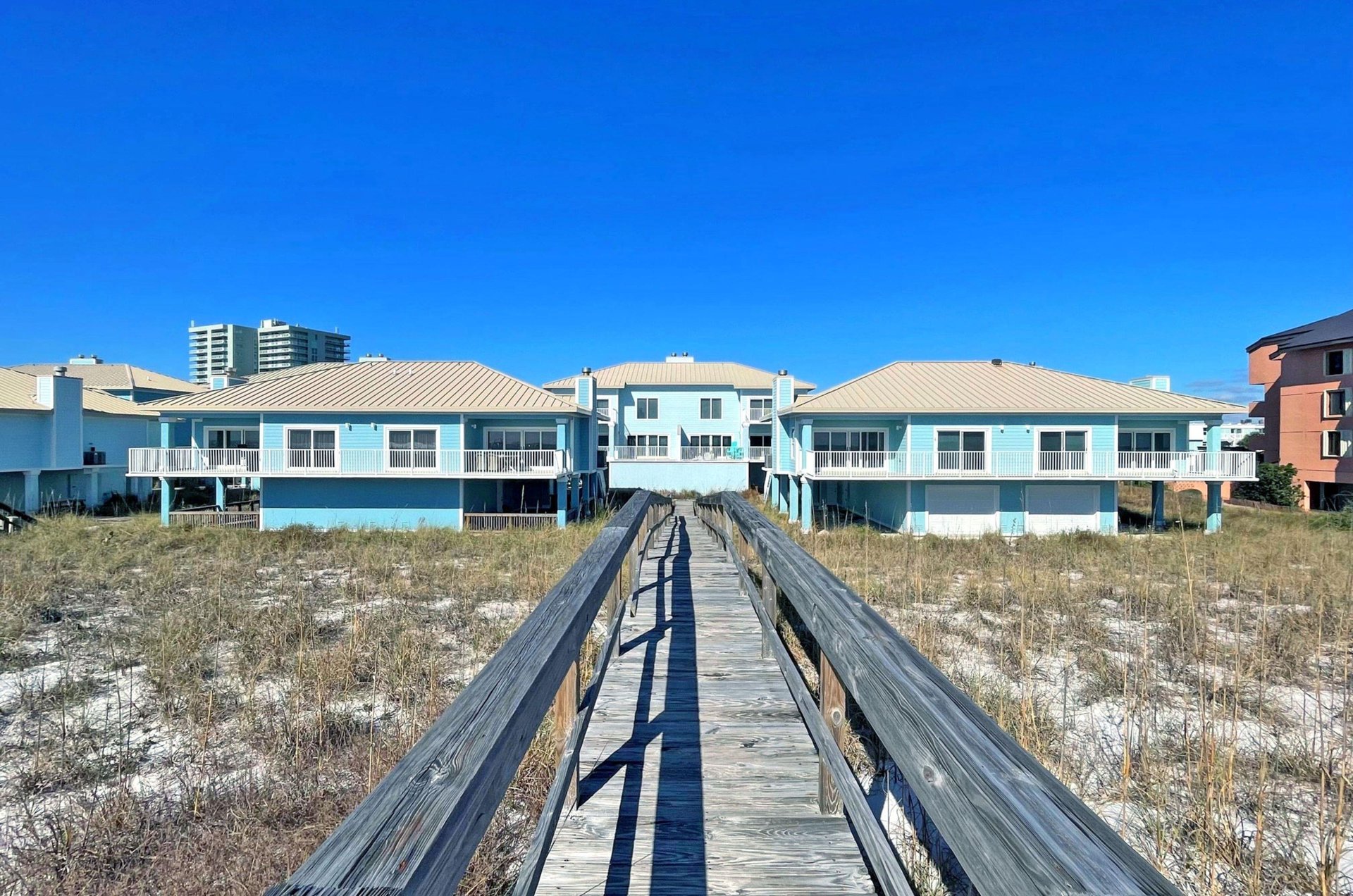 The townhomes are only steps away from the Gulf