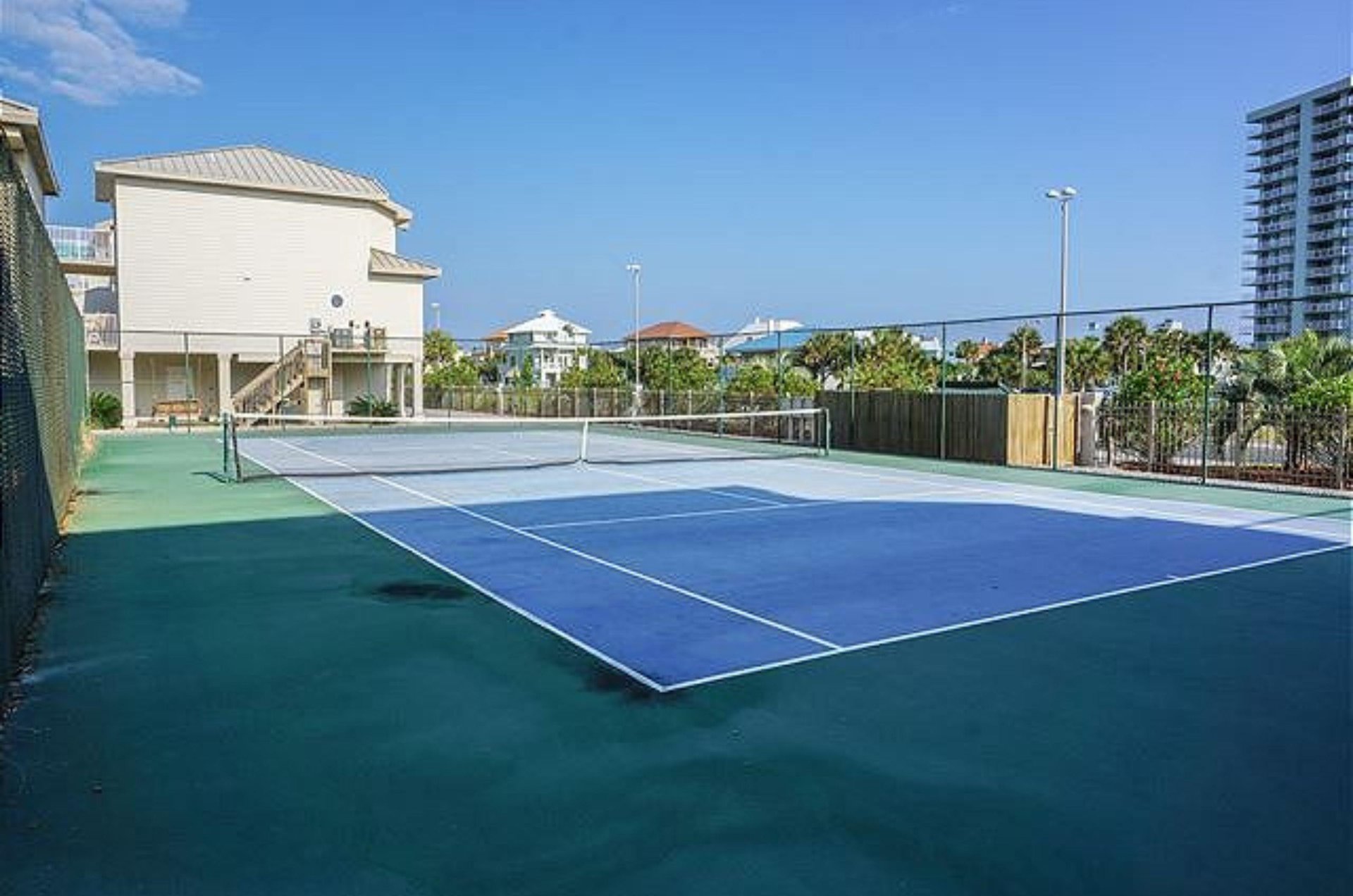 Amenities at Portside Villas include an outdoor tennis court
