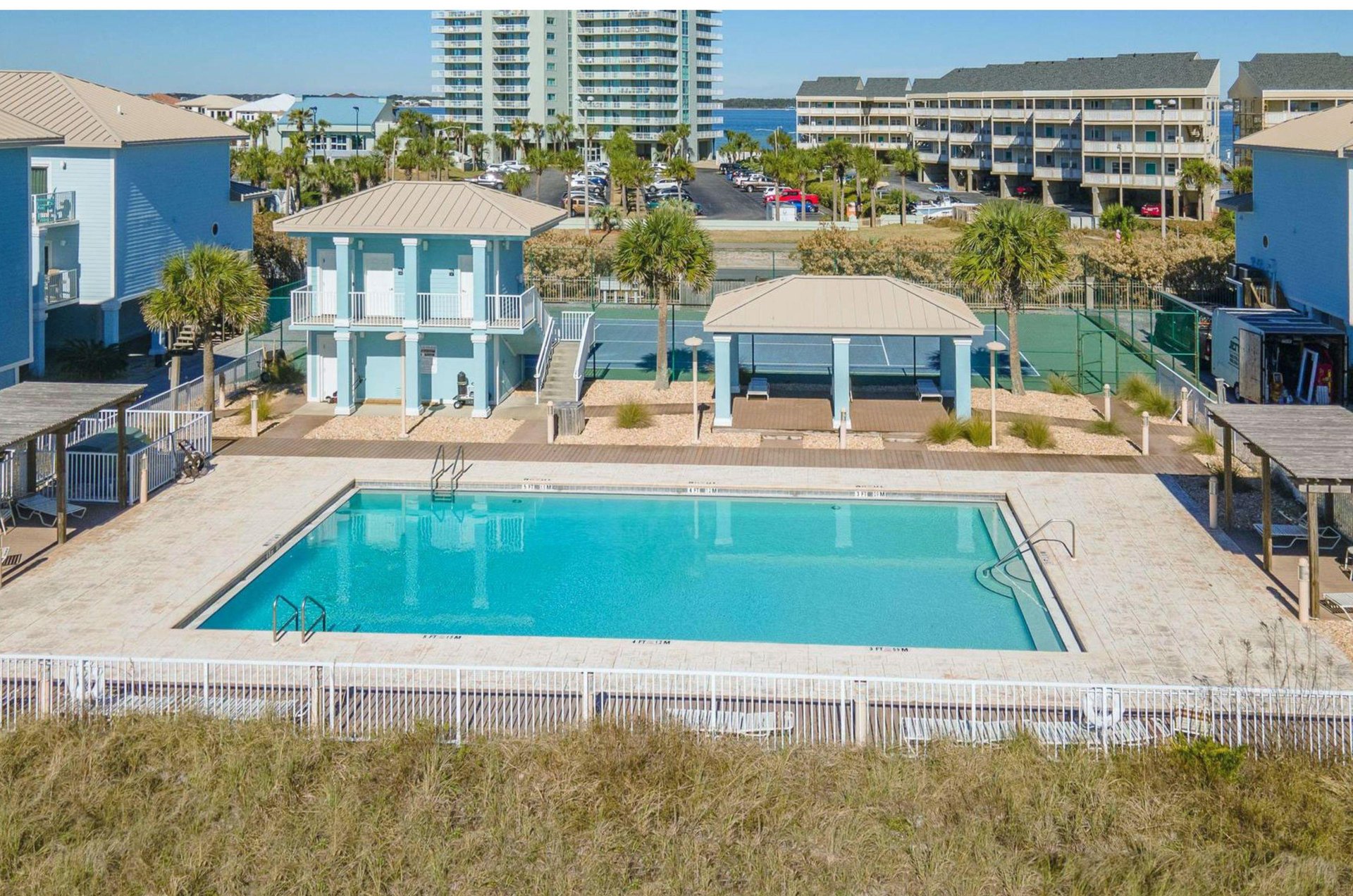 Enjoy the spacious pool deck and club house