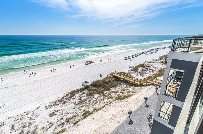 Each fourstory townhome has its own elevator and faces the beach.