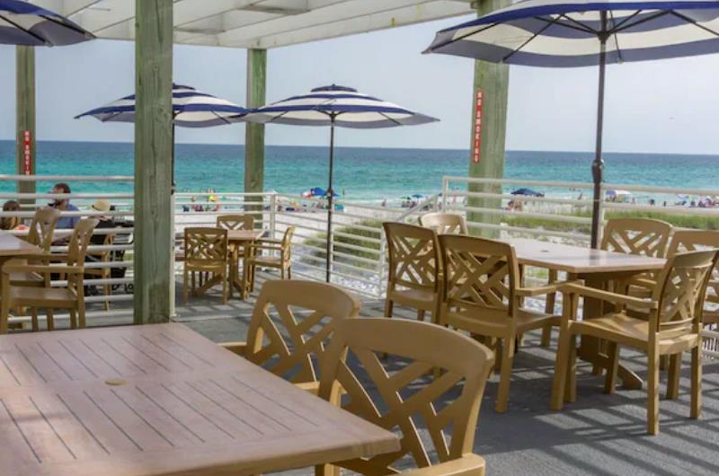 This relaxing patio overlooks the beautiful beach.