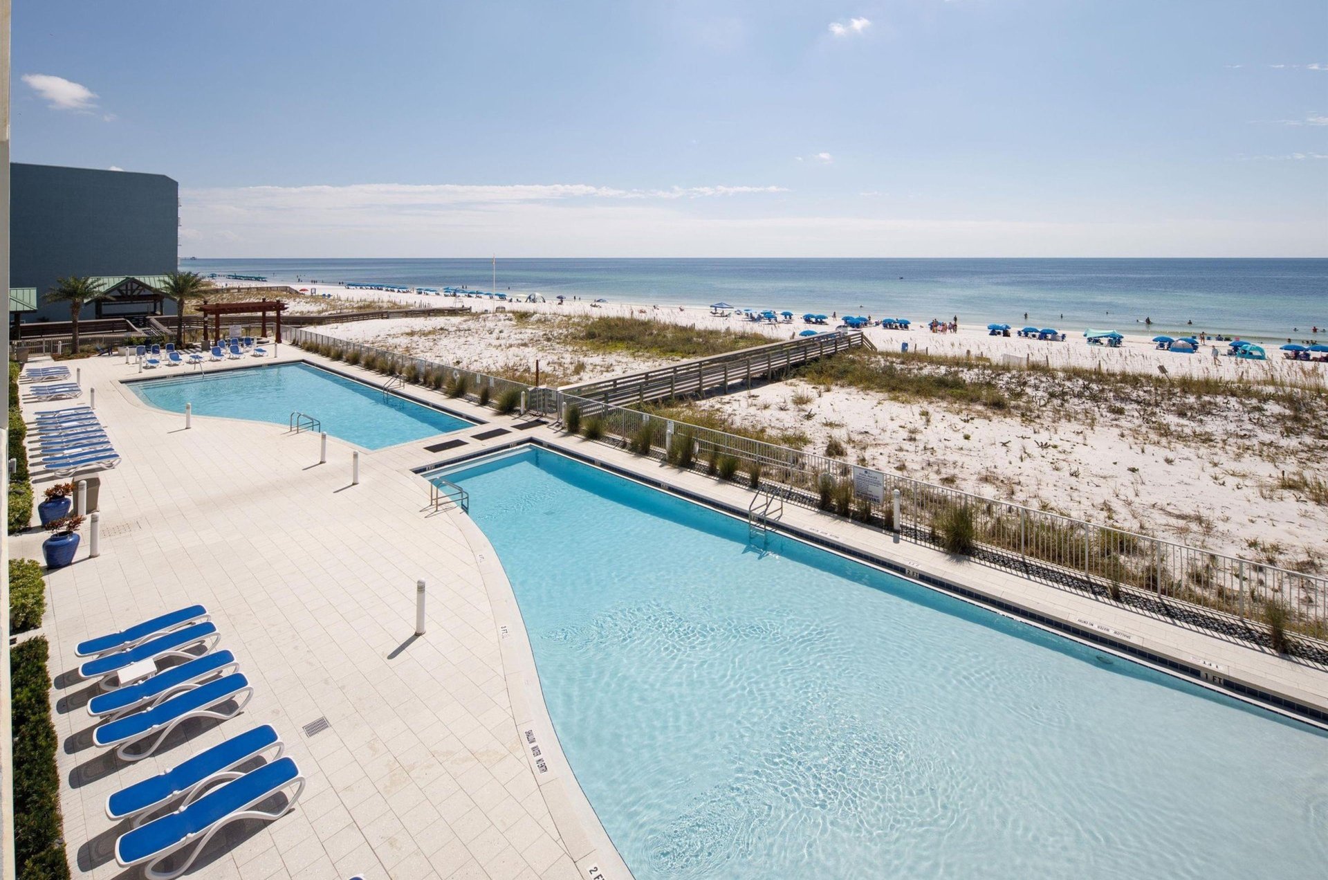 The outdoor swimming pool at Blue Condos in Fort Walton Beach, Florida
