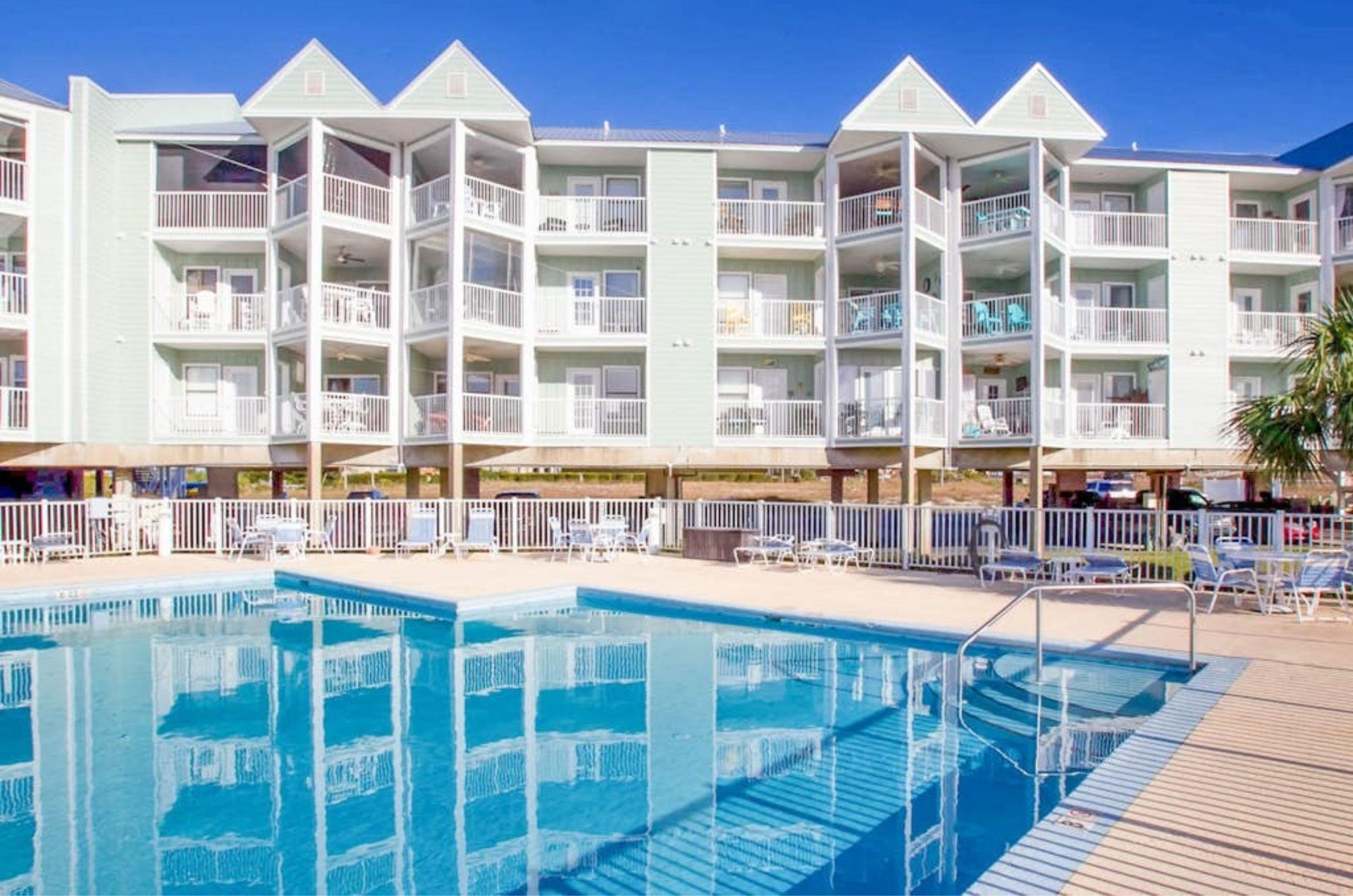 The outdoor swimming pool in front of Jubilee Landing in Orange Beach Alabama