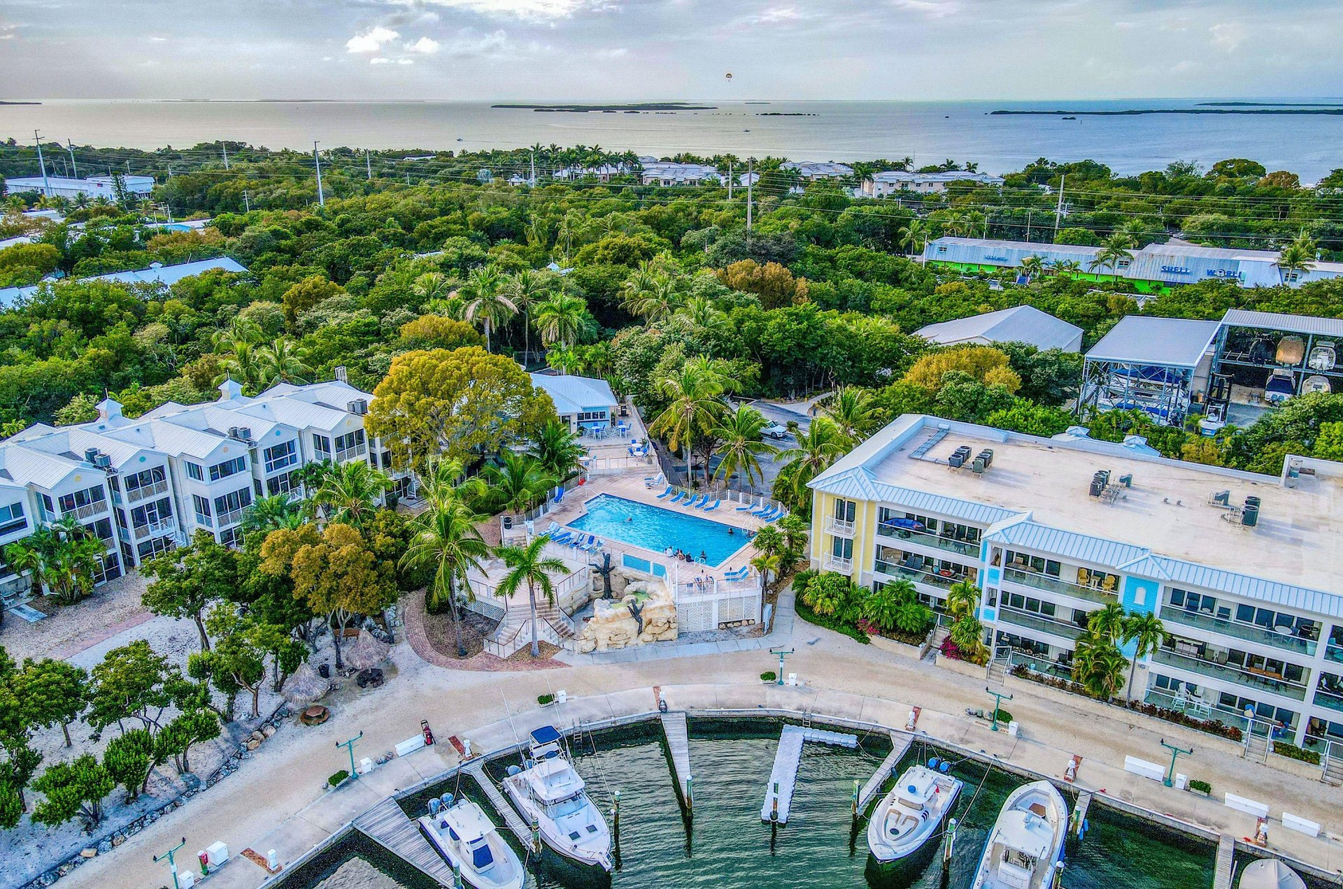 Key Largo vacation properties with a swimming pool and adjacent boat docks.