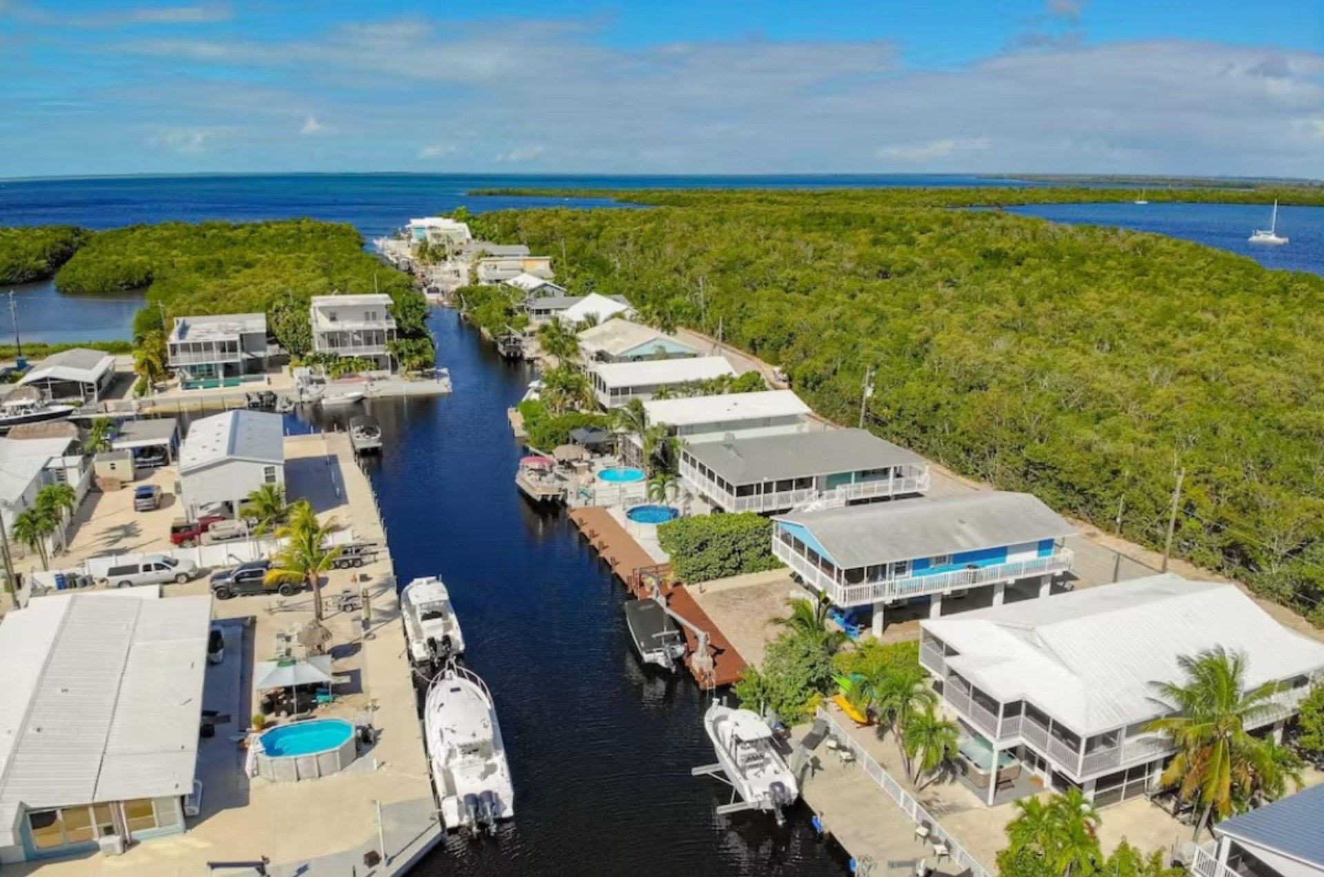 Canals make parking boats easy in front of Key Largo vacation homes.