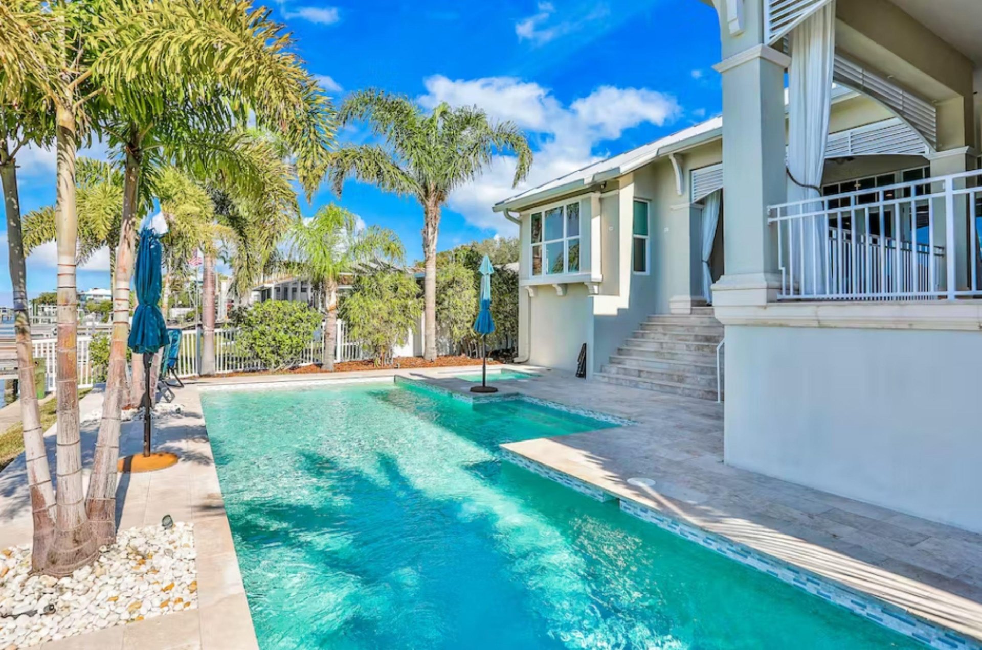 A gorgeous swimming pool beside a Clearwater vacation home.