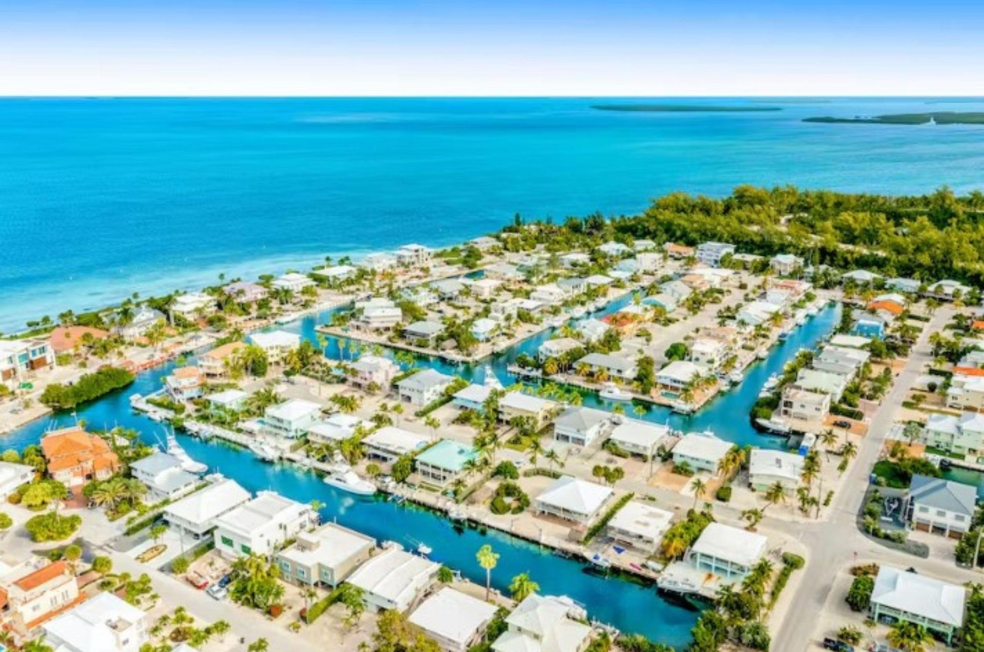 Islamorada vacation homes often have streets leading to them on one side and canals on the other side.