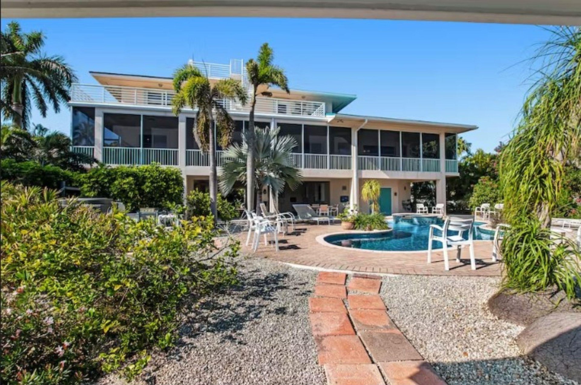 A large Islamorada vacation home with a spacious swimming pool and sundeck.