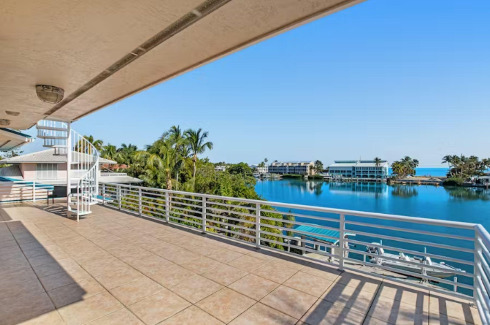 The tile deck of an Islamorada vacation home with a sweeping view of the water.