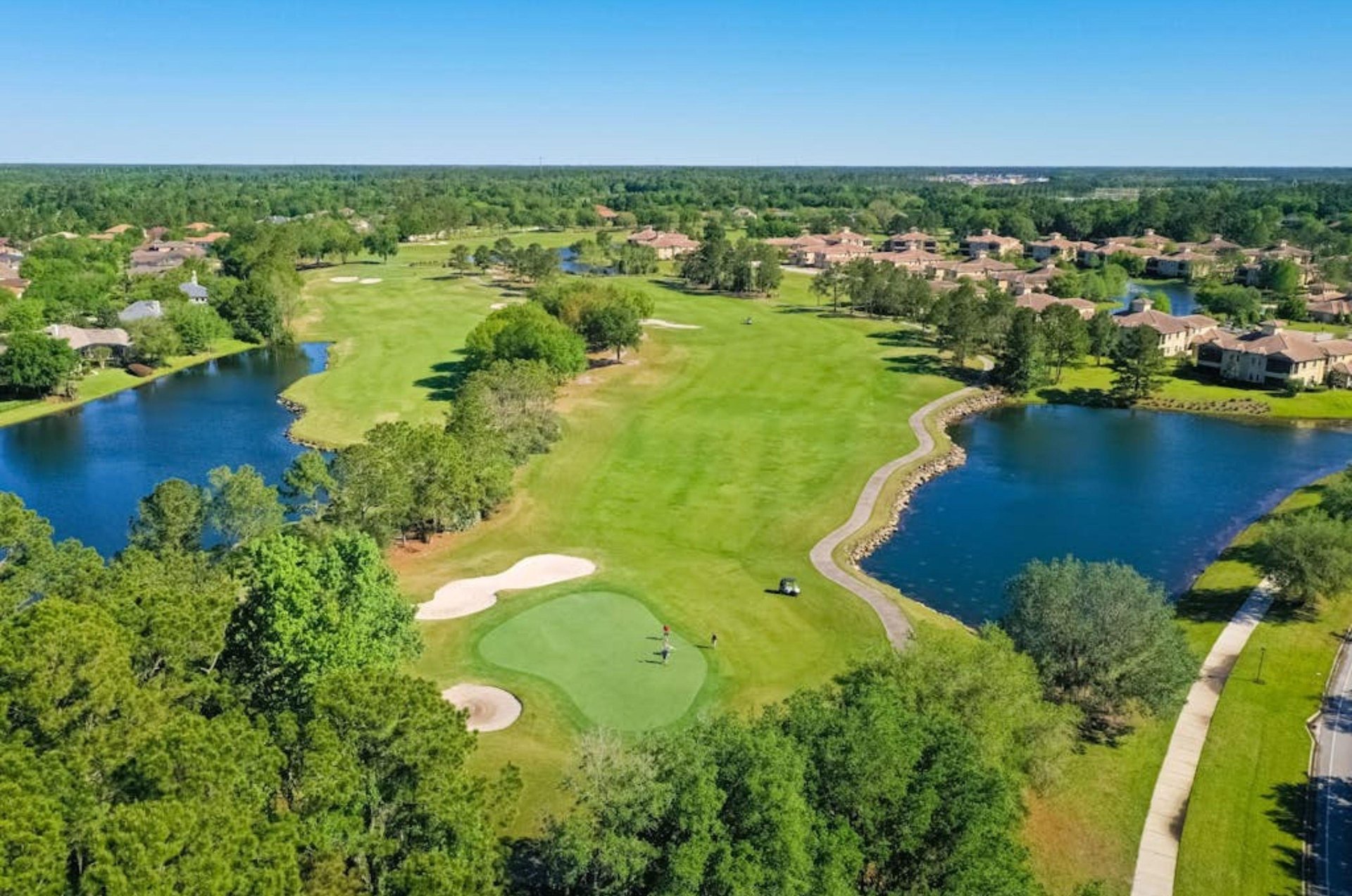 Aerial view of the golf course and condos at Luxury Golf Retreat