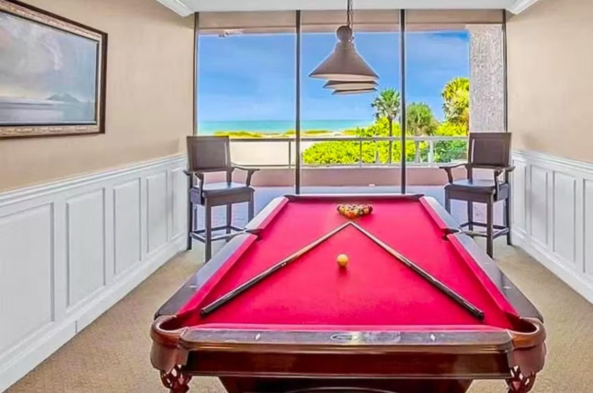 The resort has a pool table for having fun and keeping busy if it rains.
