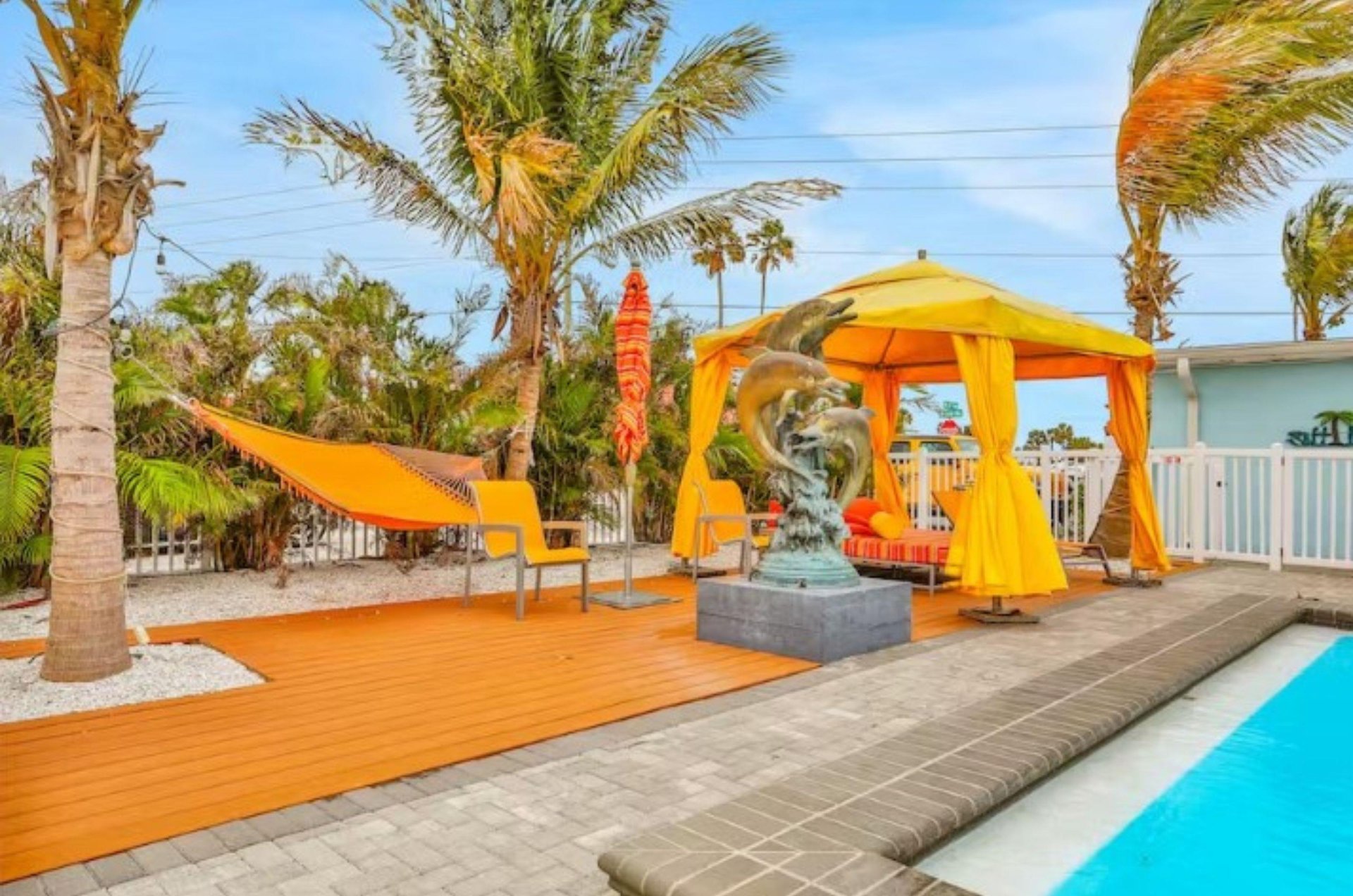 The complexs sundeck provides several places to rest and relax.