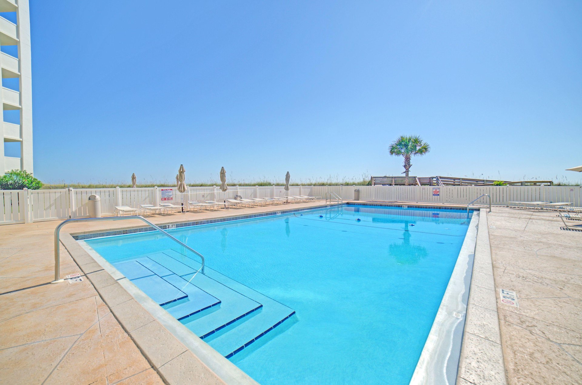 The beachside, outdoor swimming pool at Regency Towers
