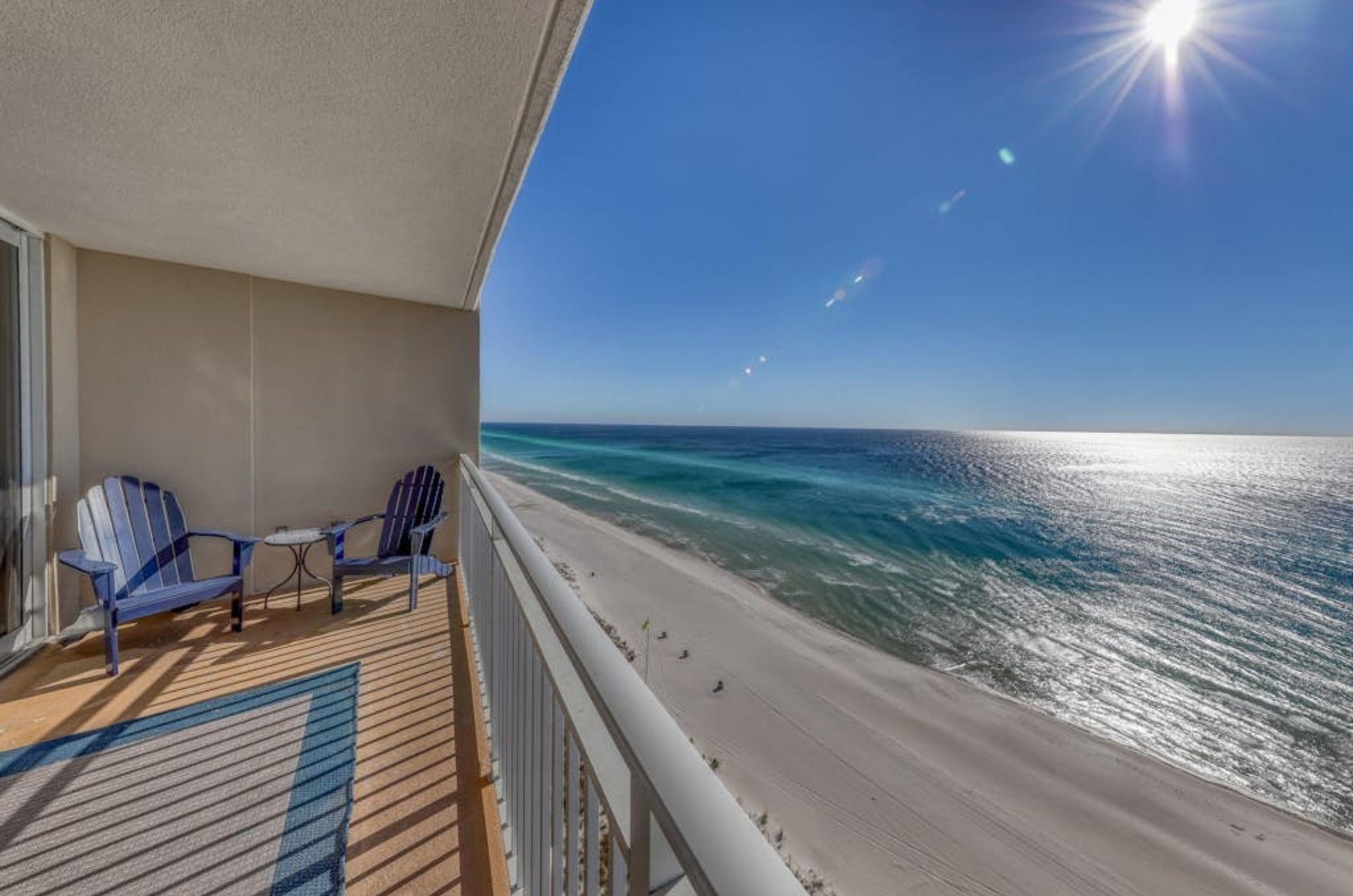 A chair on a private balcony overlooking the Gulf at Emerald Beach Resort