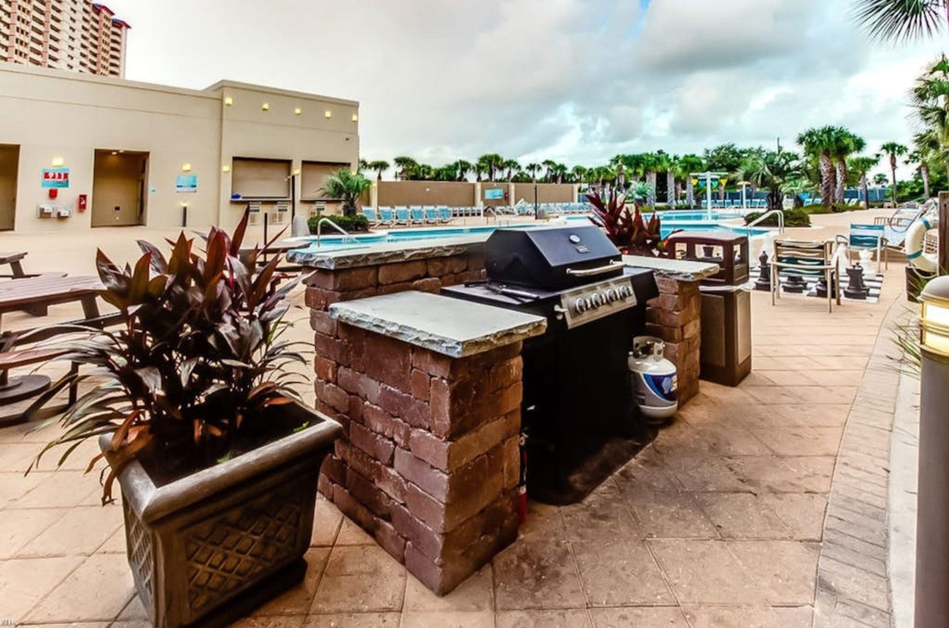 Barbecue grills on the pool deck at Emerald Beach Resort in Panama City Beach Florida