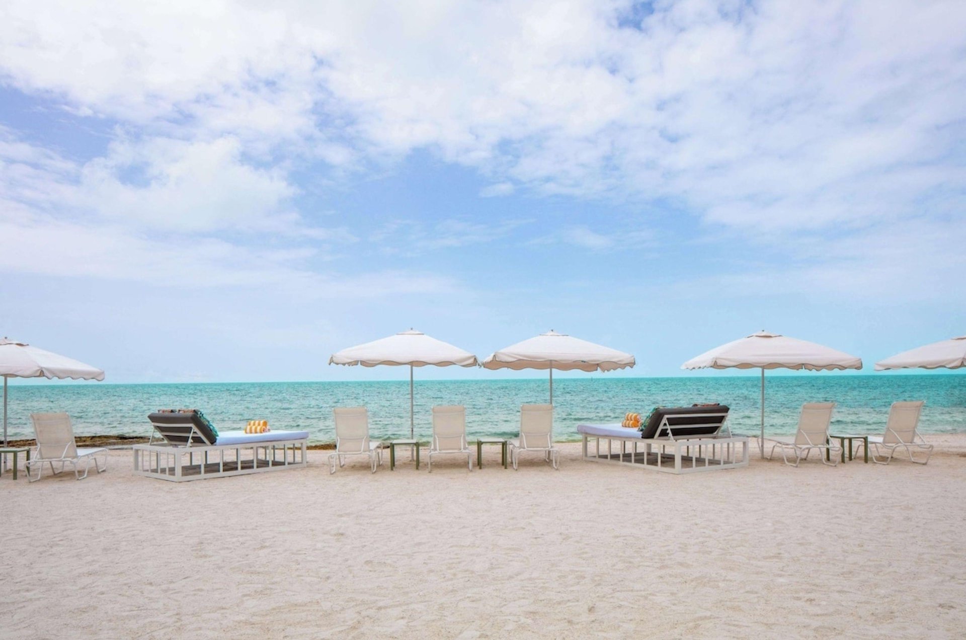The private beach with loungers at Casa Marina Key West