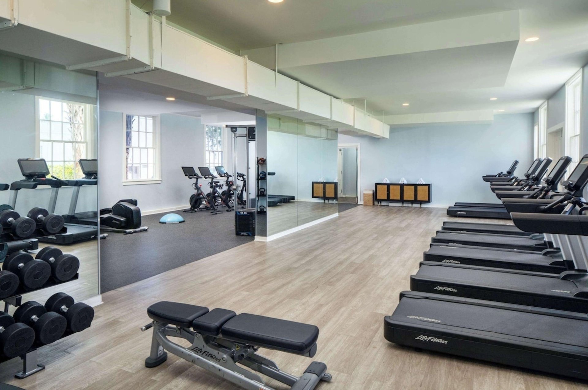 Cardio equipment and weights in the gym at Casa Marina