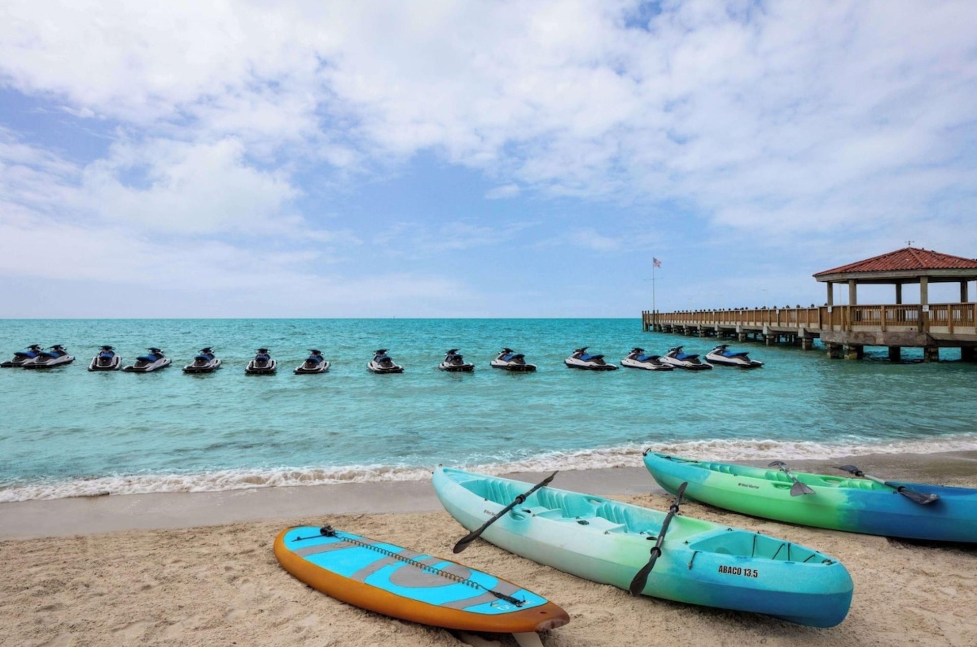 Kayaks and jet skis on the water in Key West, Florida