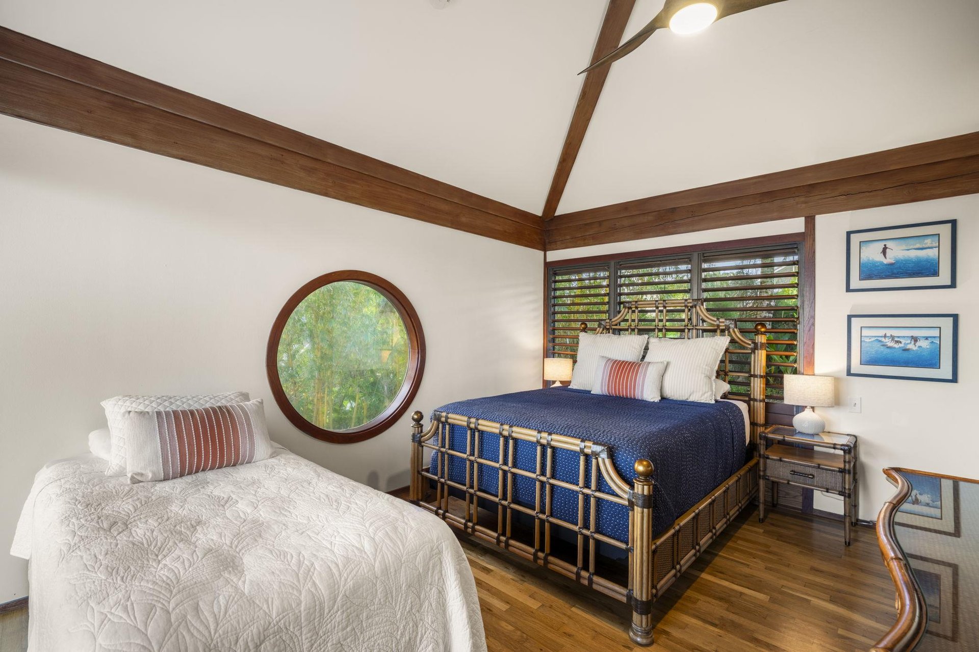 Queen bed and twin bed with pool and ocean views