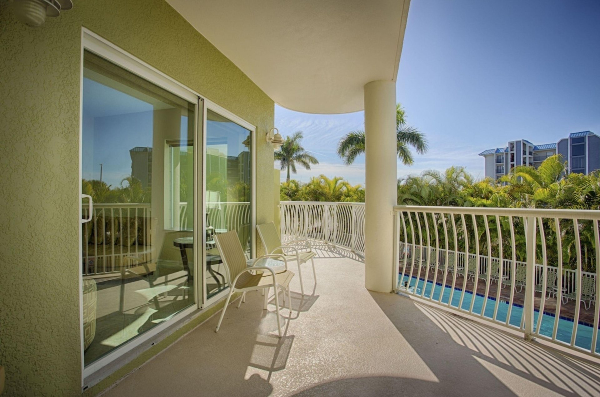 A balcony with chairs