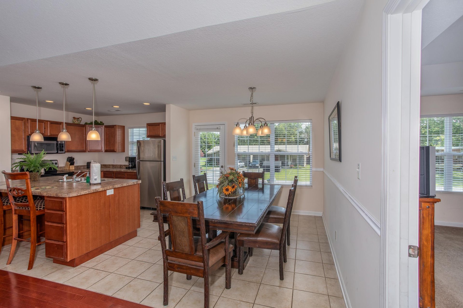 Dining room table with seating for six at A Pigeon Forge Retreat, a 2 bedroom cabin rental located in Pigeon Forge