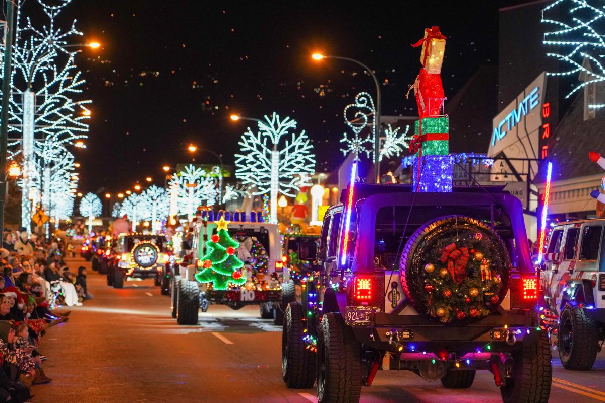 jeeps covered in christmas lights in fantasy of lights christmas parade in gatlinburg