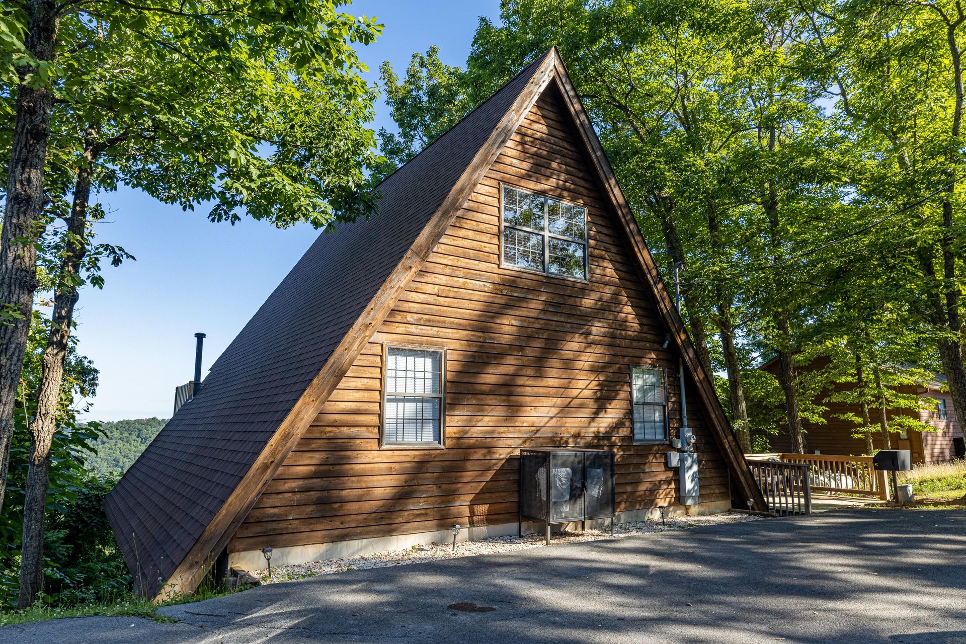 Exterior with flat parking and grill at Cozy Mountain View, a 1 bedroom cabin rental located in Pigeon Forge