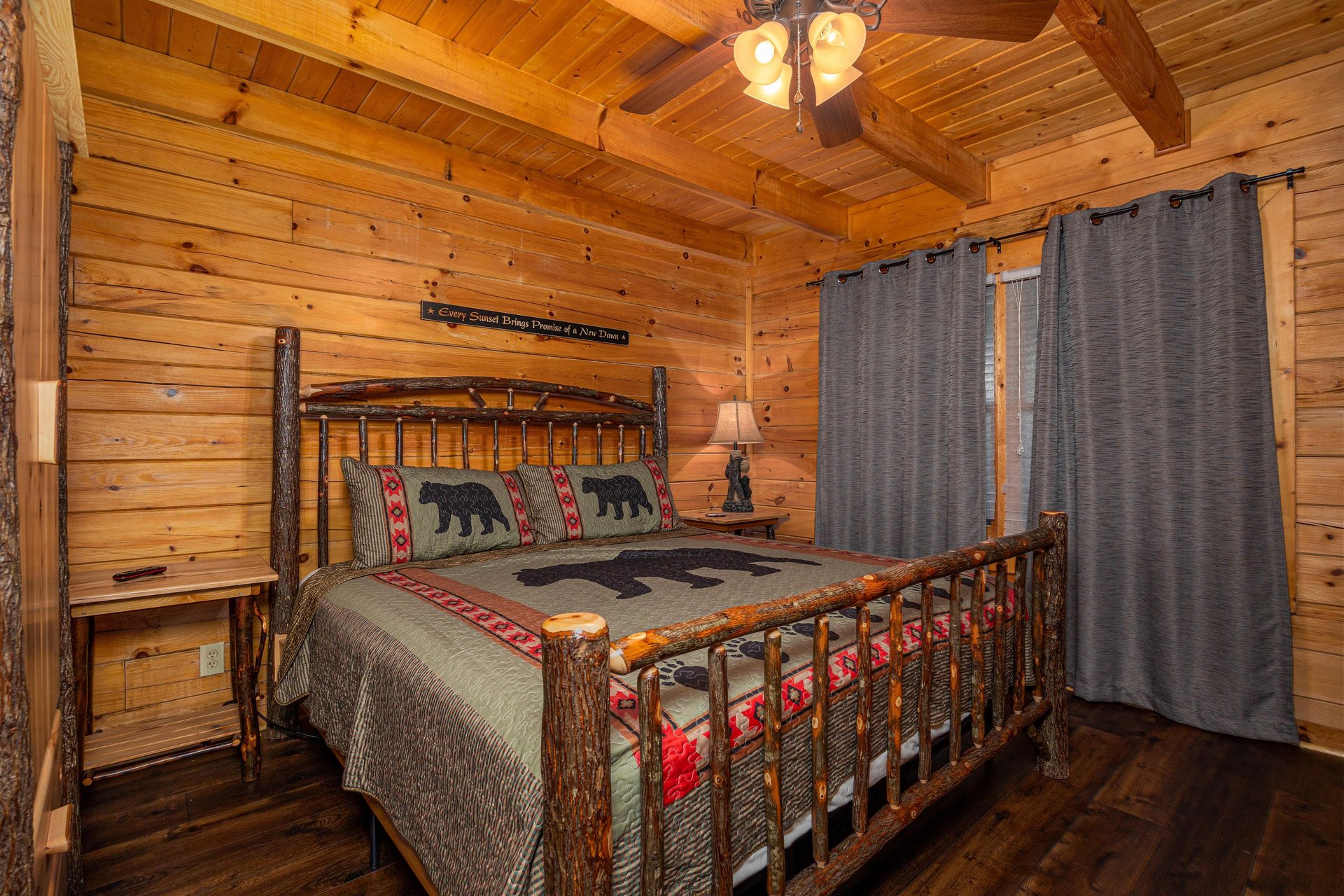 Log Bed at Eagles Nest, a 2 bedroom cabin rental located in Sevierville