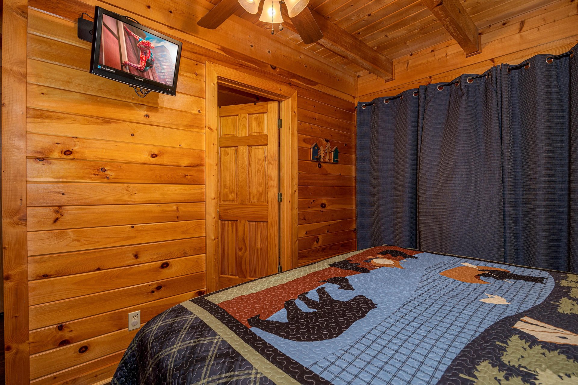 Flat Screen in the bedroom at Eagles Nest, a 2 bedroom cabin rental located in sevierville
