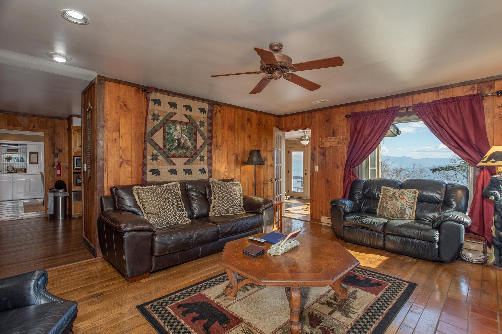 Living room with a sofa, chair, and loveseat at Best View Ever A 5 bedroom cabin rental in Pigeon Forge