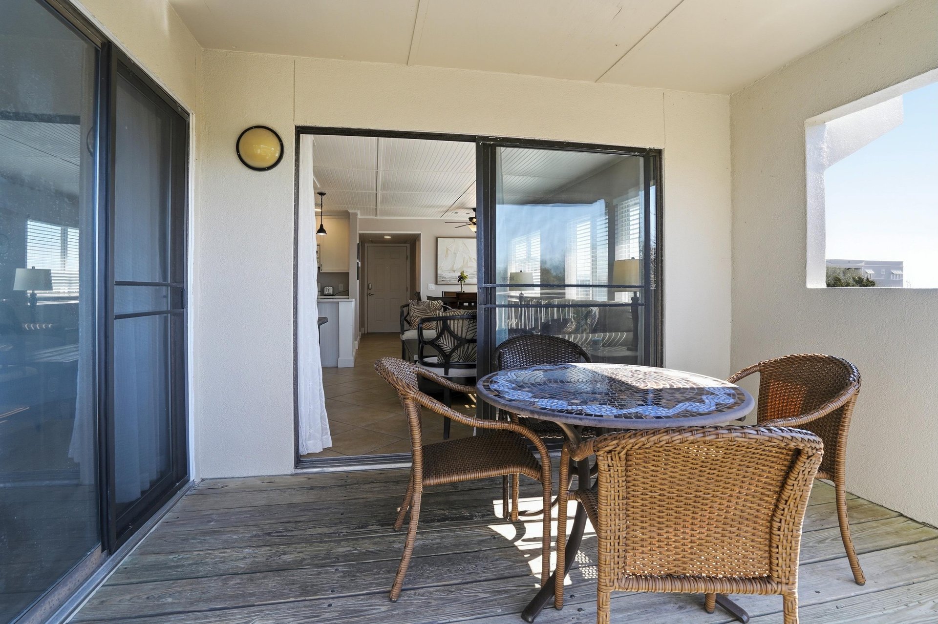 This covered balcony connects directly to the living space, creating an easy indooroutdoor flow for meals and time outside.