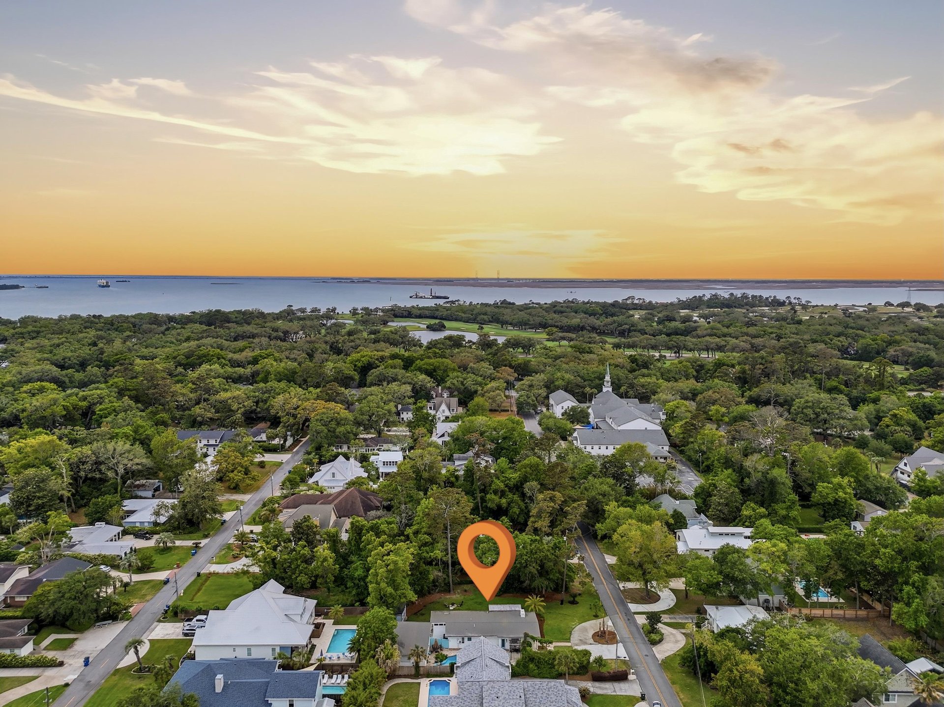 Aerial view of 530 Delegal showing the property location and surrounding neighborhood near St. Simons Sound.
