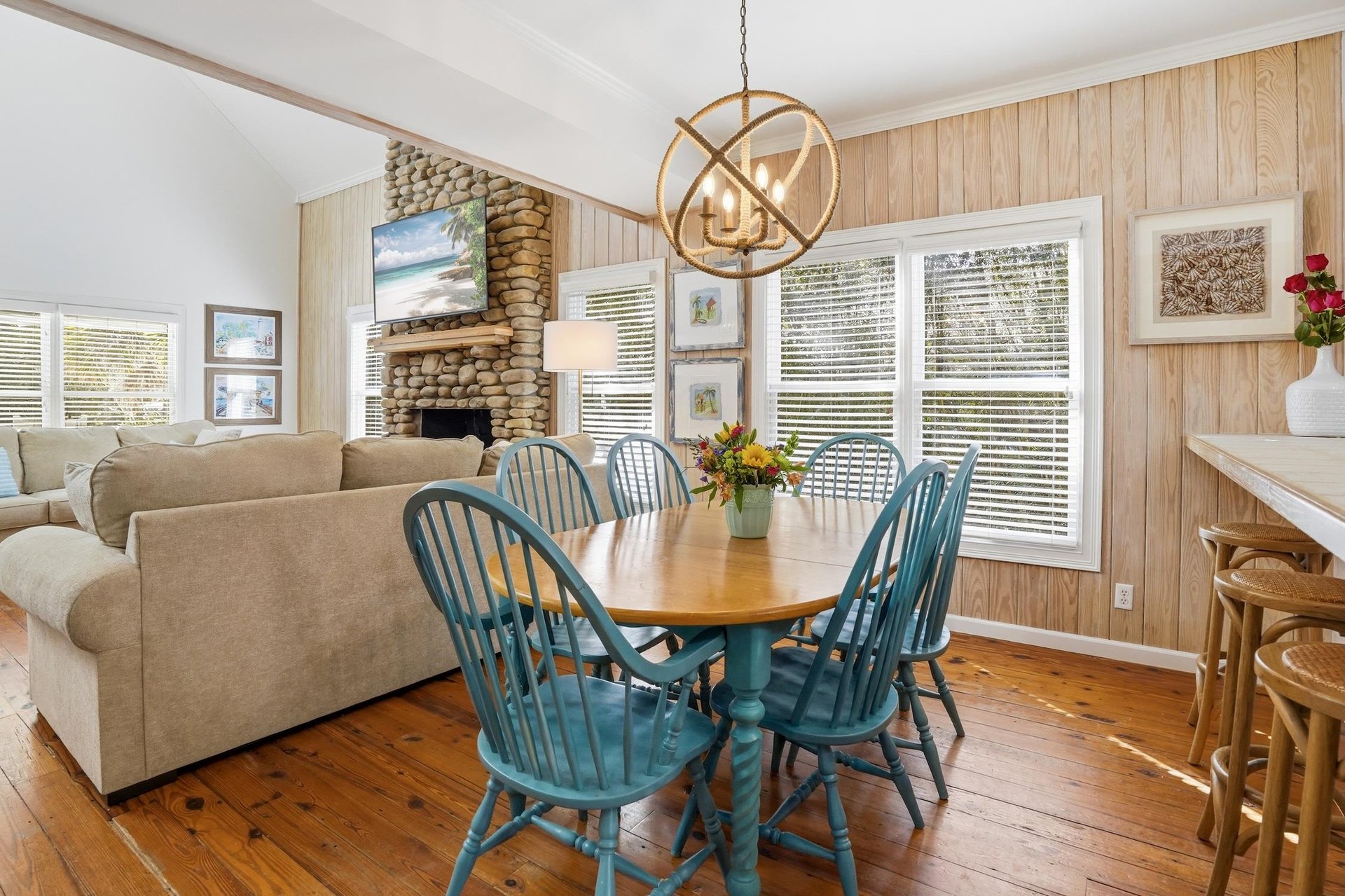Dining table sits between the kitchen and living room, keeping meals, games, and conversation connected on the main floor.