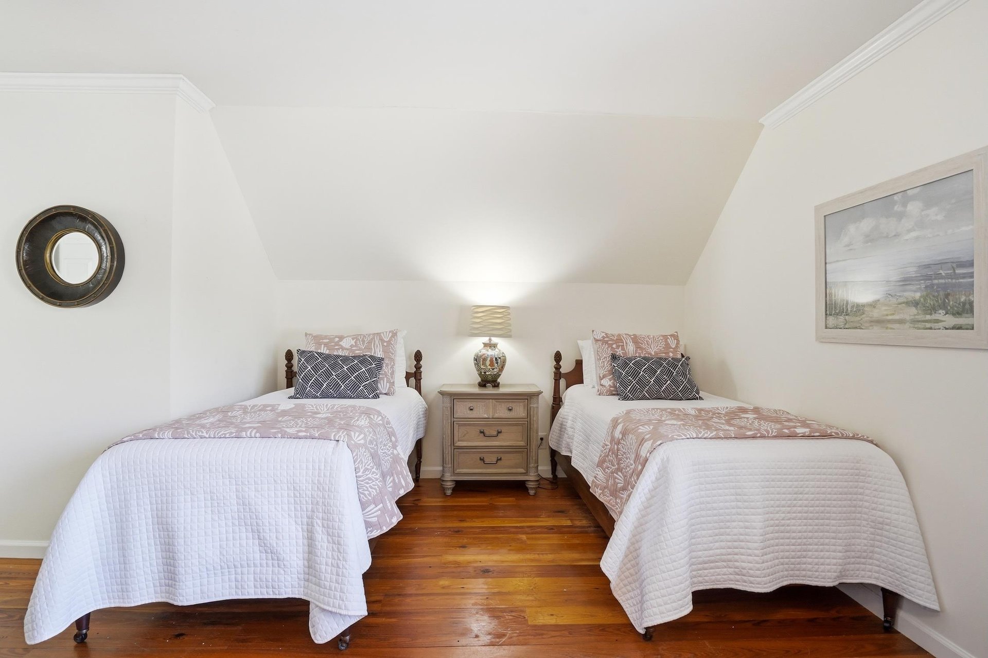 Close view of the twinbed side of the upstairs bedroom that also includes a king bed.