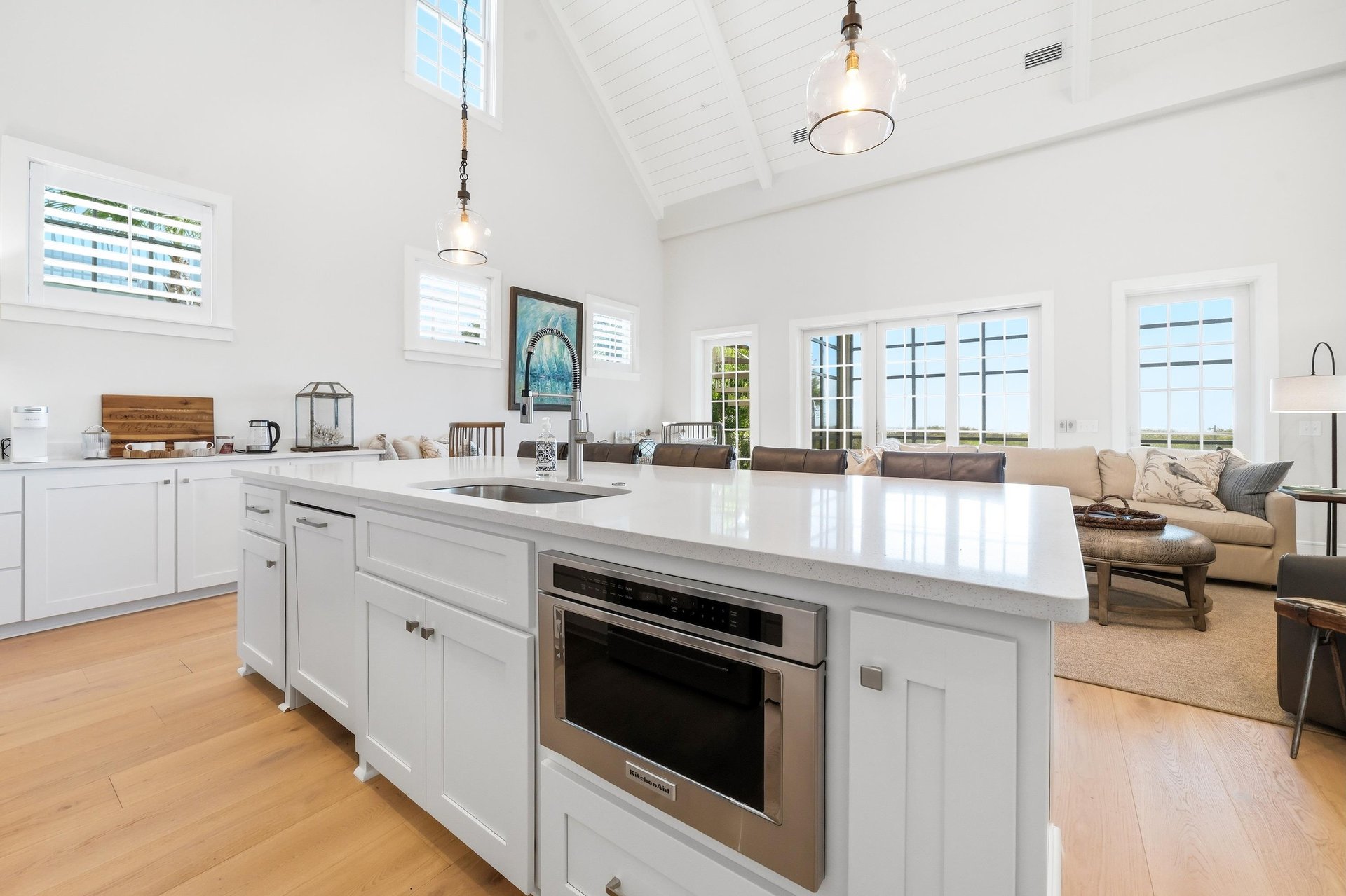 Open sightlines connect meal preparation with the living and dining areas.