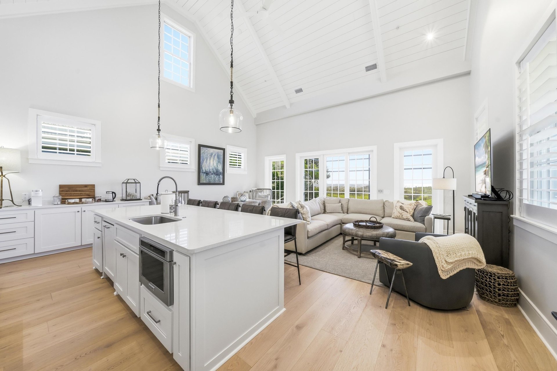 Meals, conversation and time on the sectional share one open space.